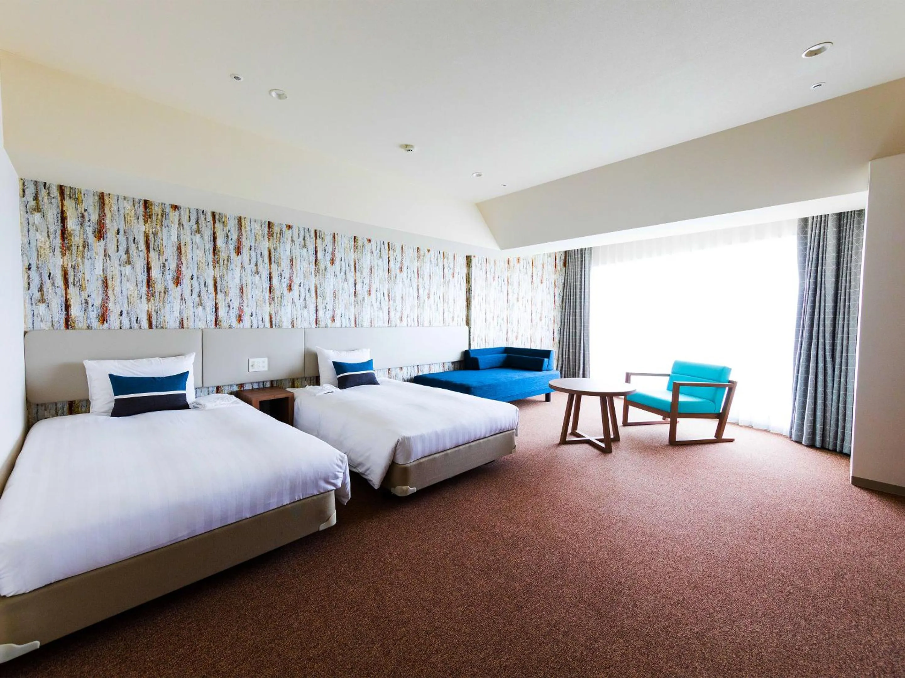 Bed in Okinawa Grand Mer Resort