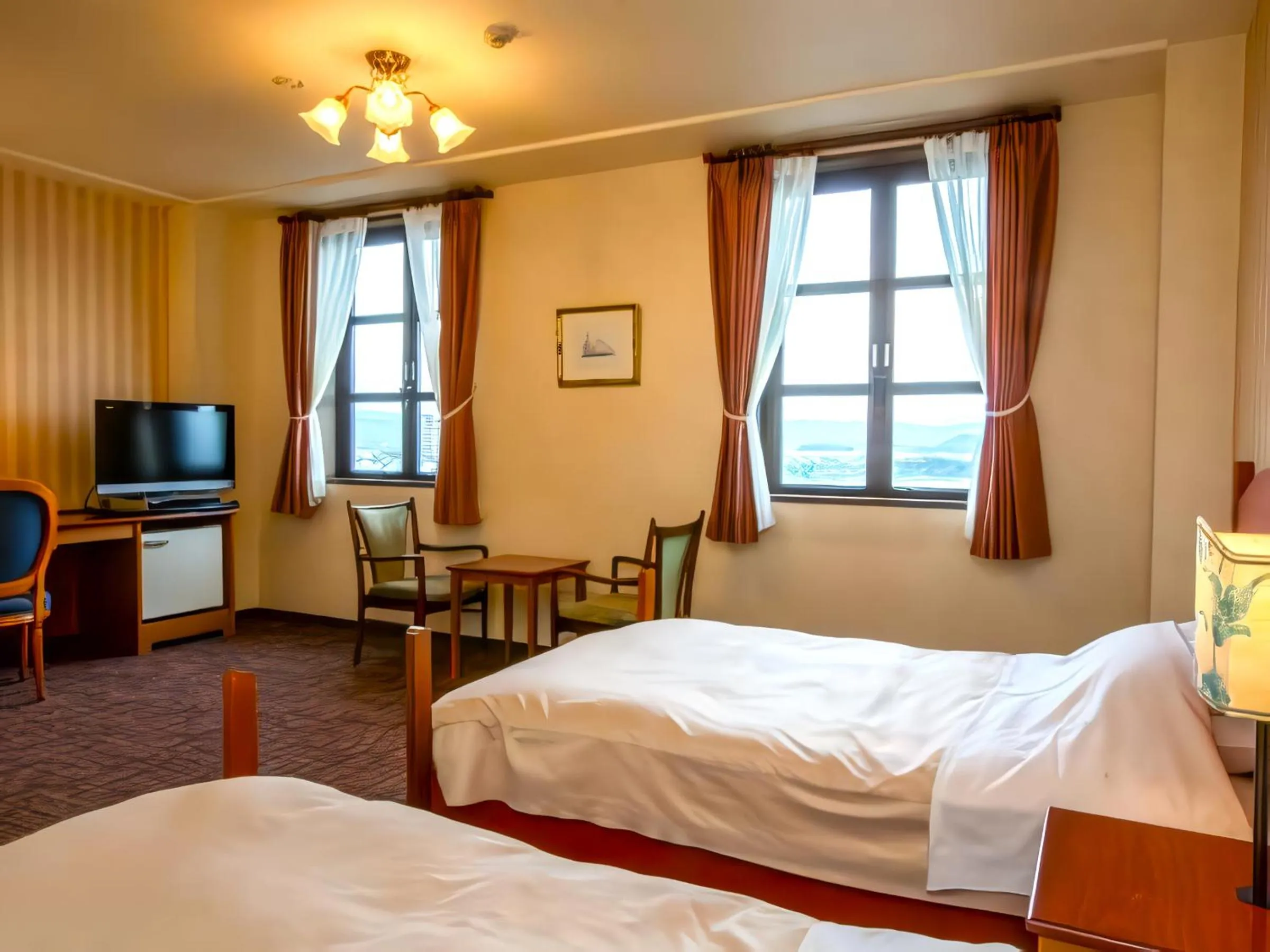 Bed in Kitabiwako Hotel Grazie