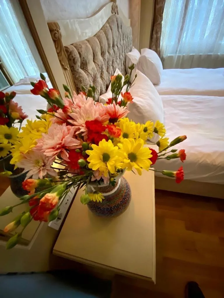 Bed in Optimist Hotel