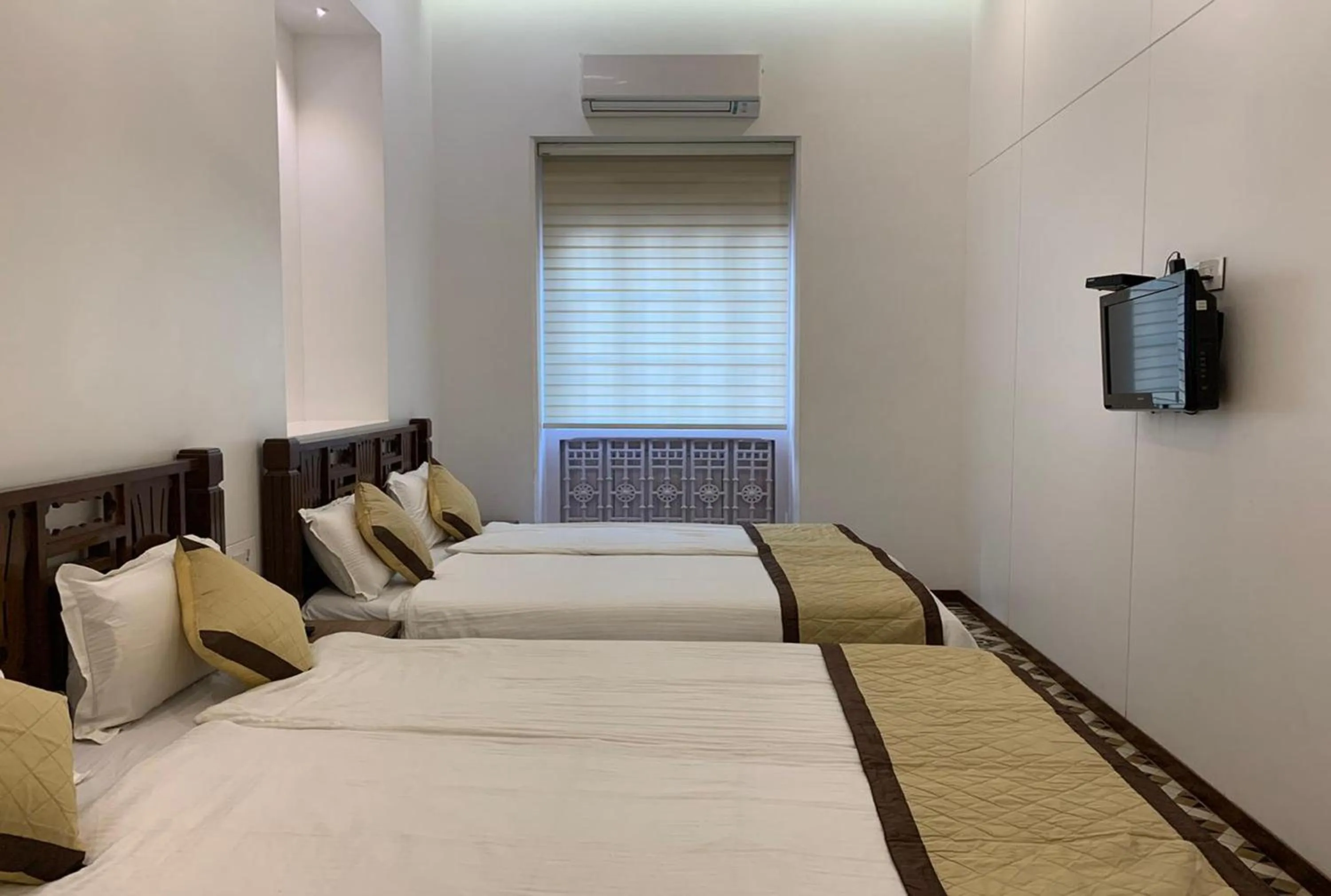 Bed in Carlton Hotel Mumbai - Behind Taj Mahal Palace Colaba Mumbai