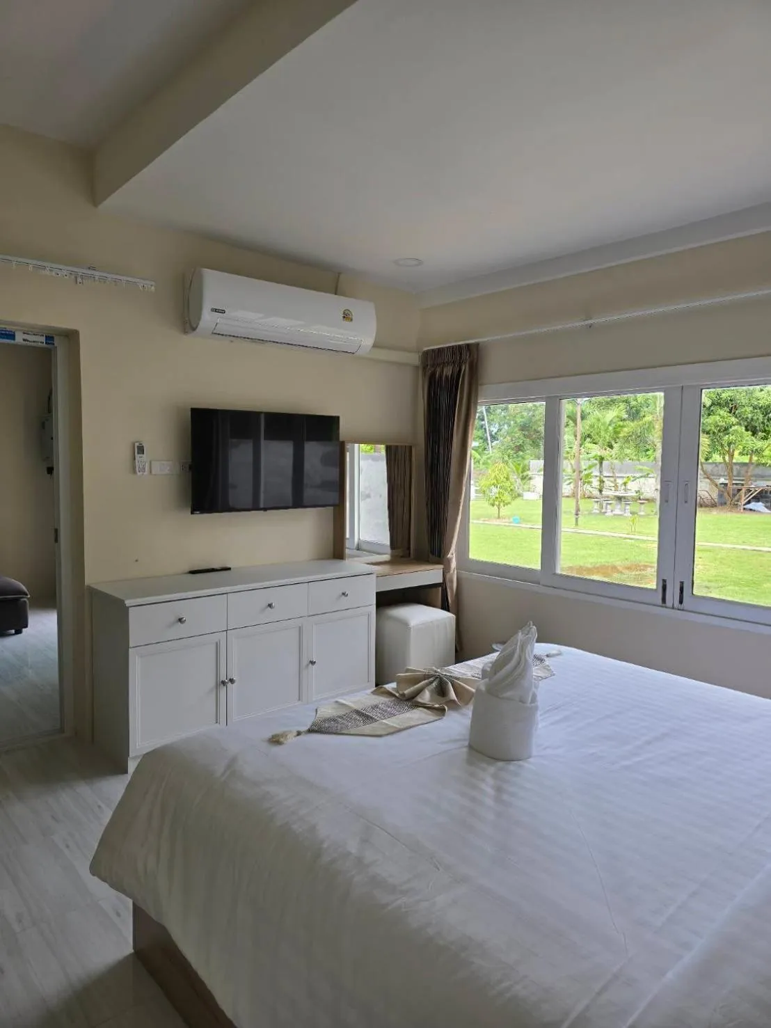 Bed in Natural Samui Hotel