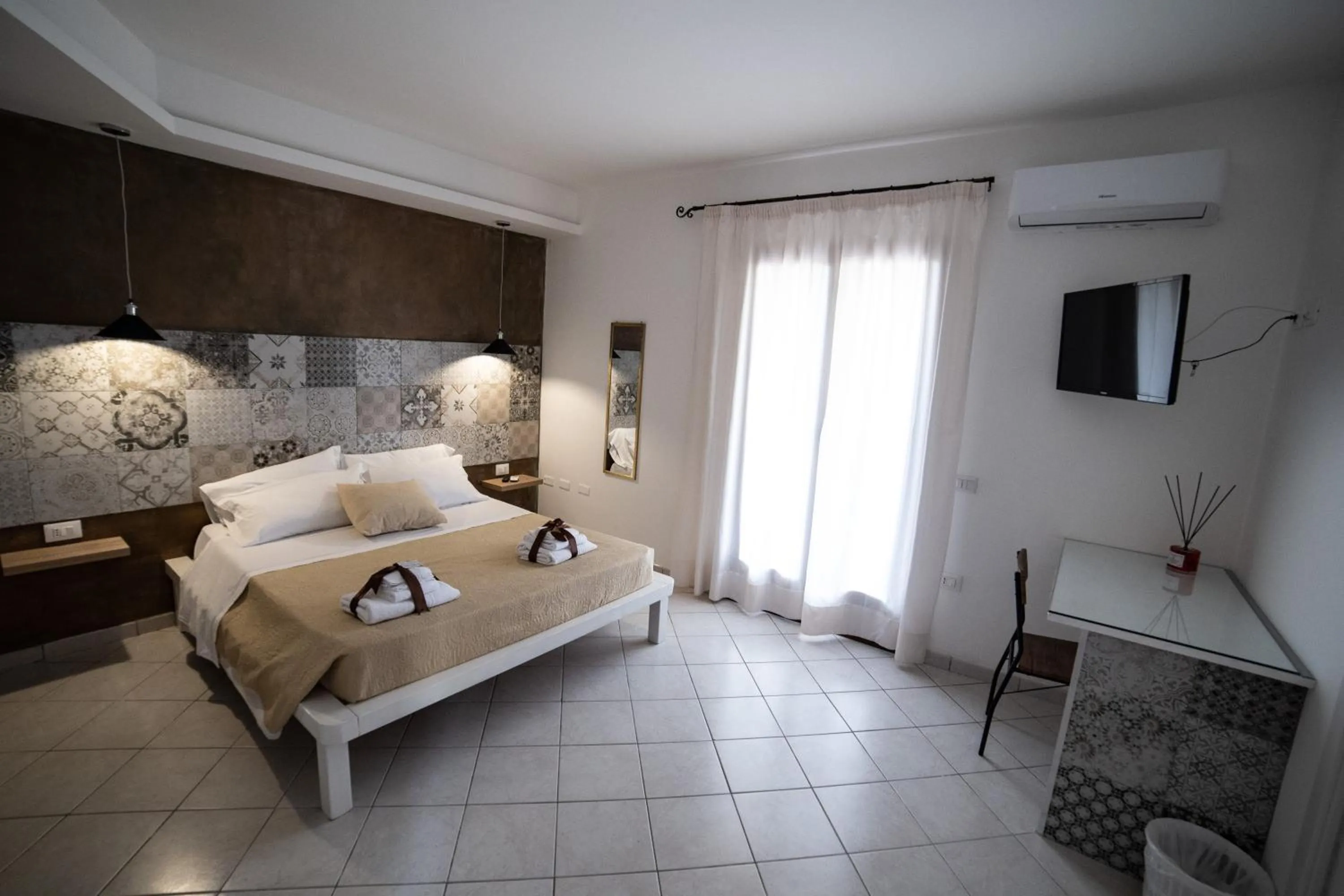 Photo of the whole room, Bed in Villa Saturno