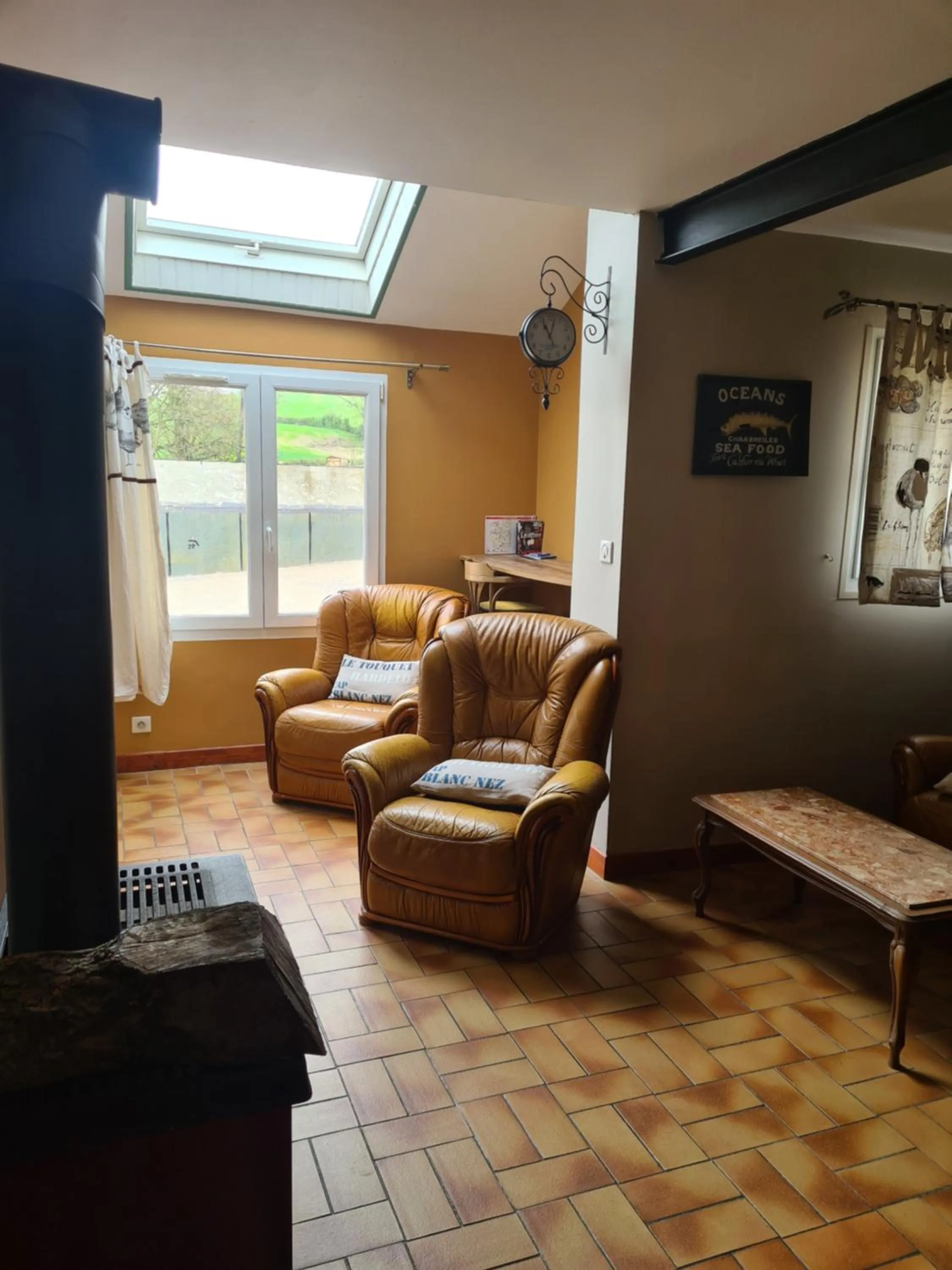 Communal lounge/ TV room in Le clos de Tournes