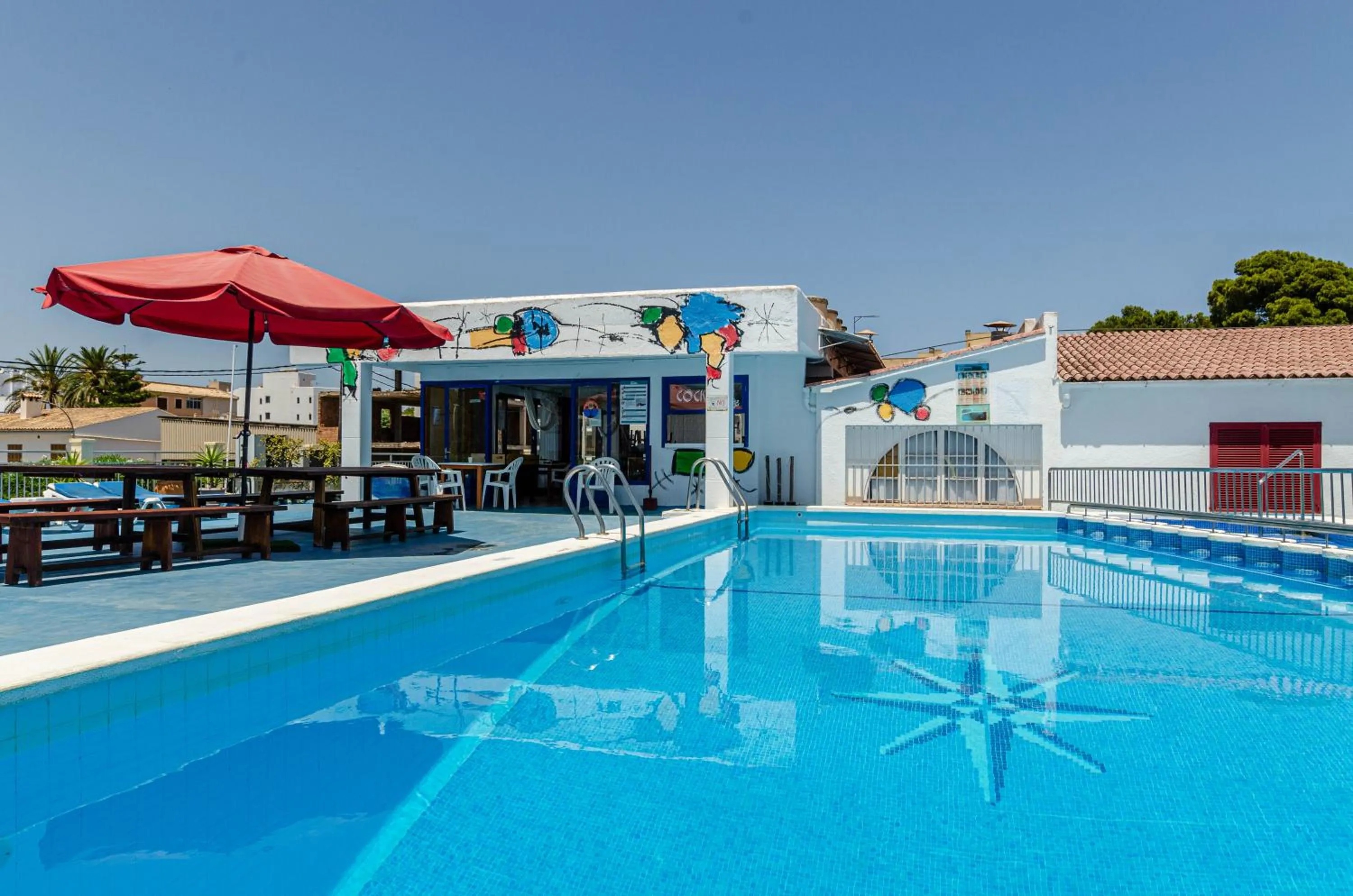 Swimming pool in Hostal Gami Adults Only