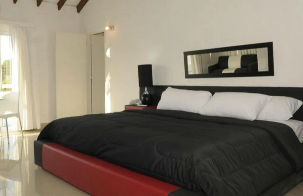 Bedroom, Bed in Punta del Este Arenas Hotel