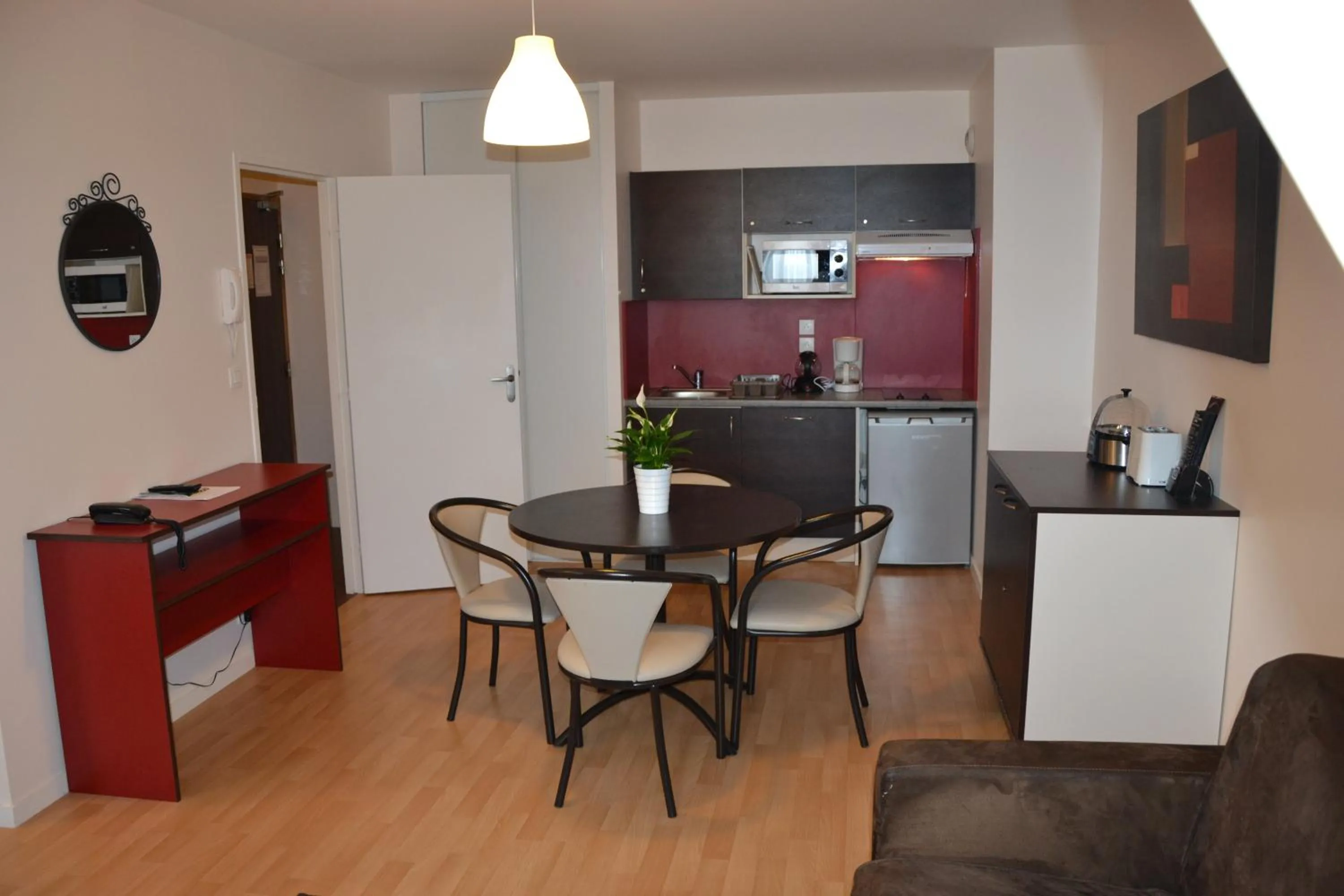 Kitchen or kitchenette in Brit Hotel Spa Le Connetable