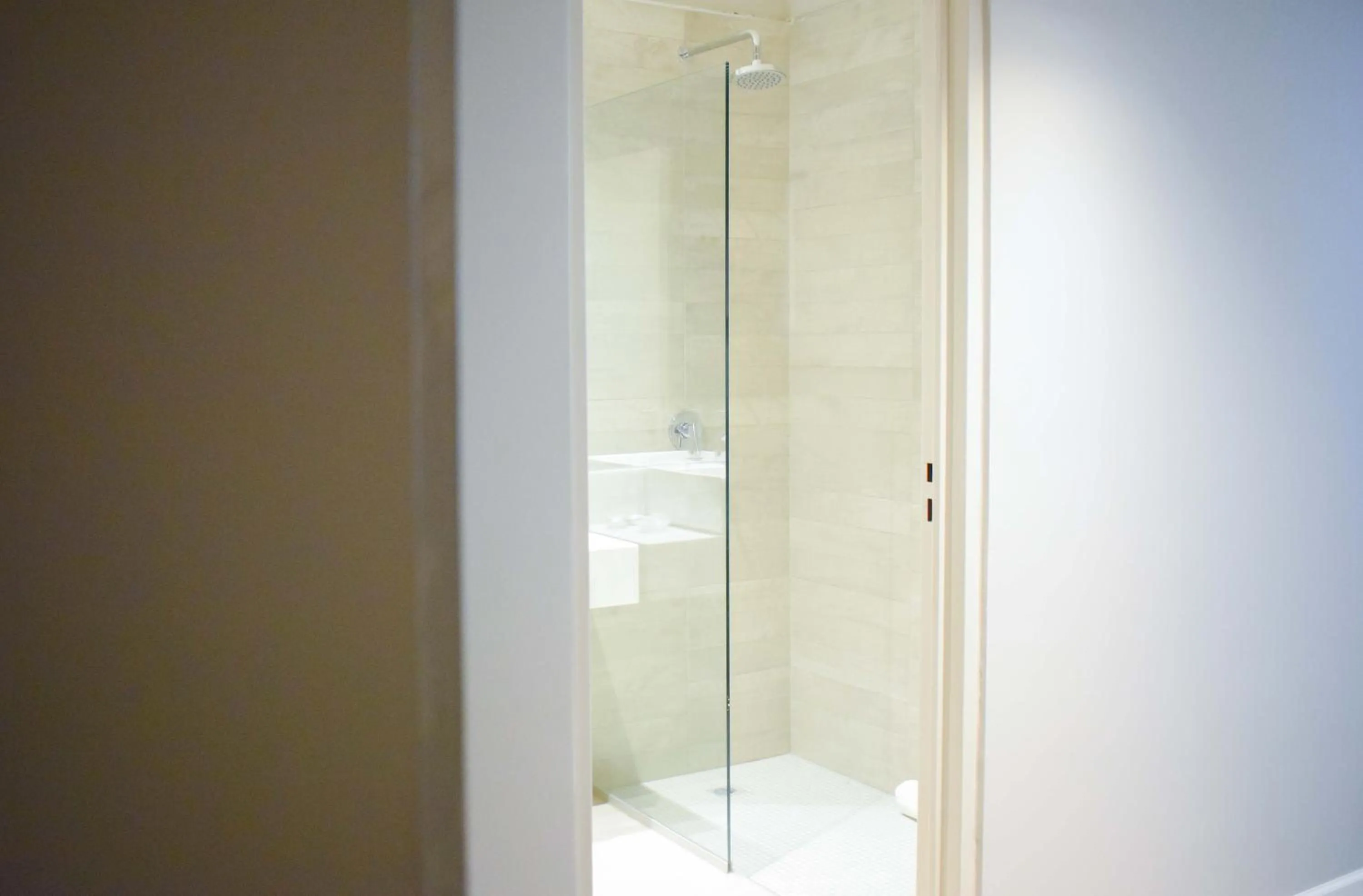 Shower in Cyan Soho Neuquén Hotel