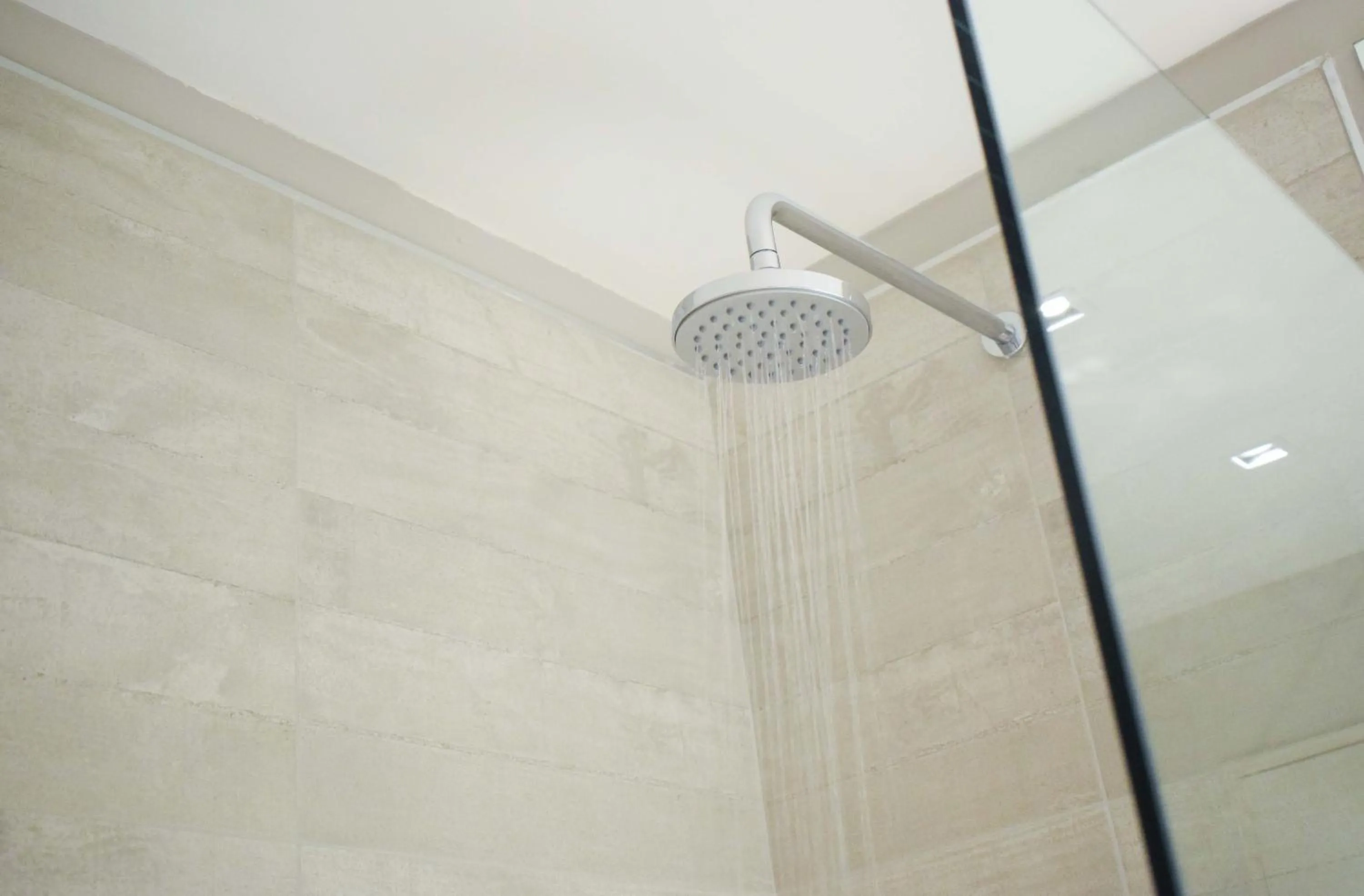 Shower in Cyan Soho Neuquén Hotel