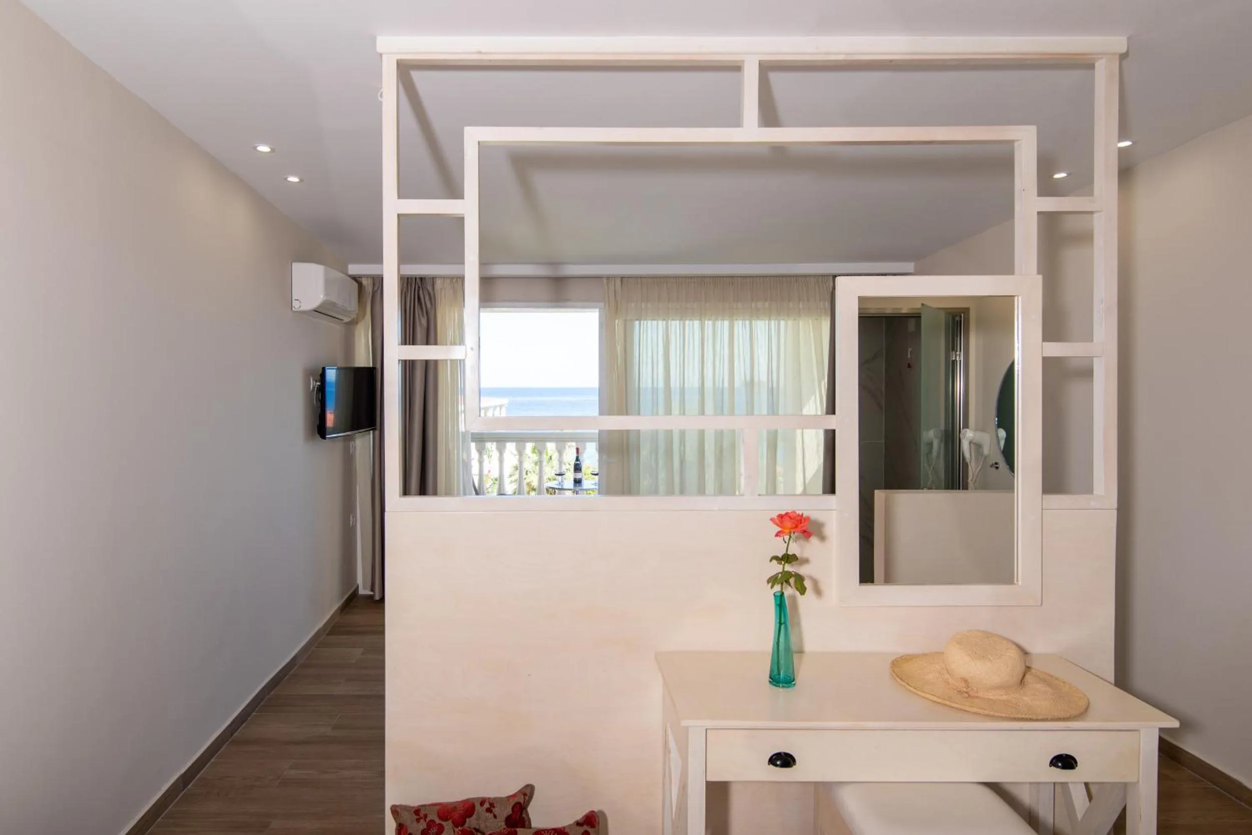 Bedroom in Belussi Beach Hotel & Suites