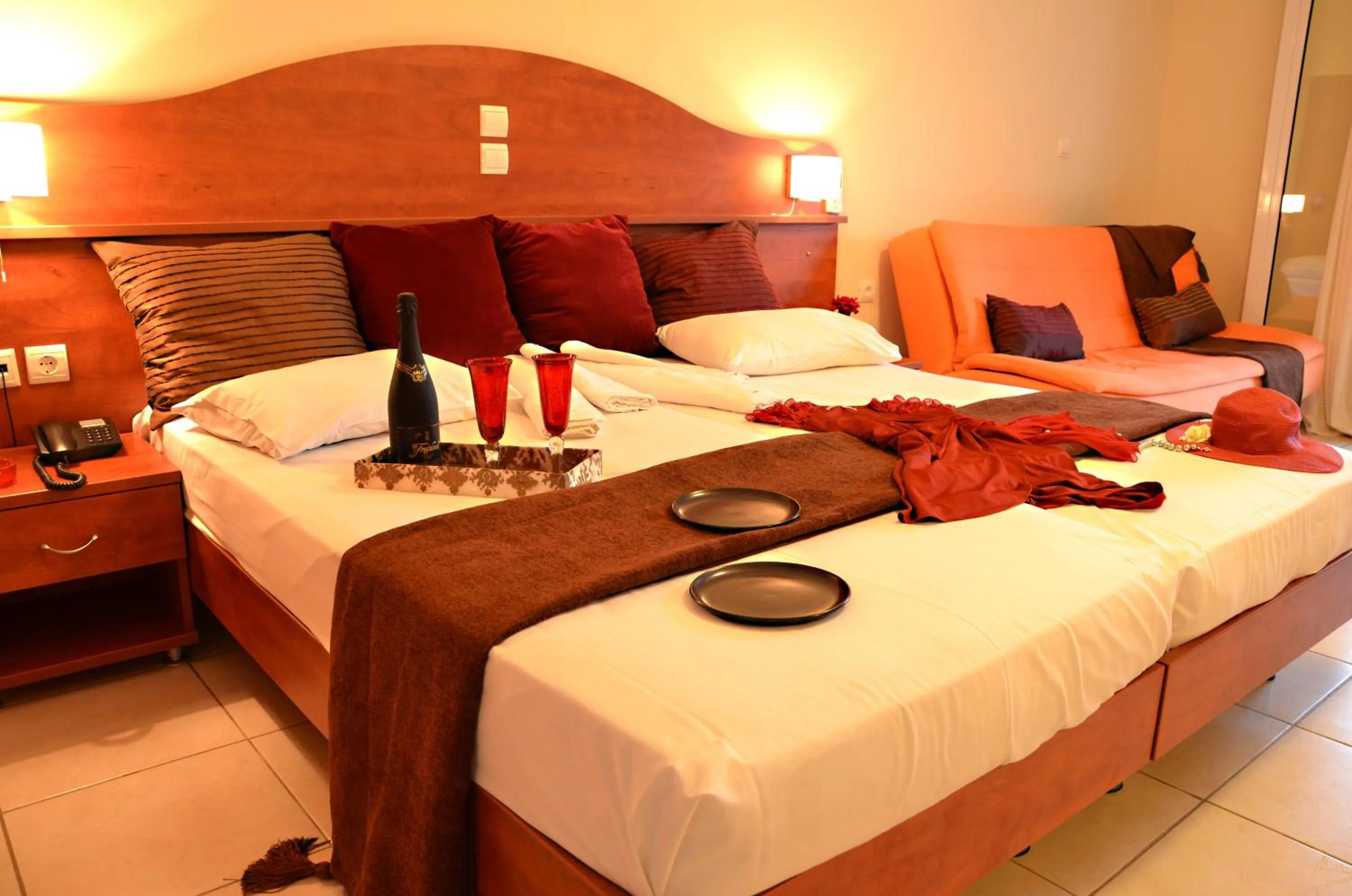 Bed in Belussi Beach Hotel & Suites