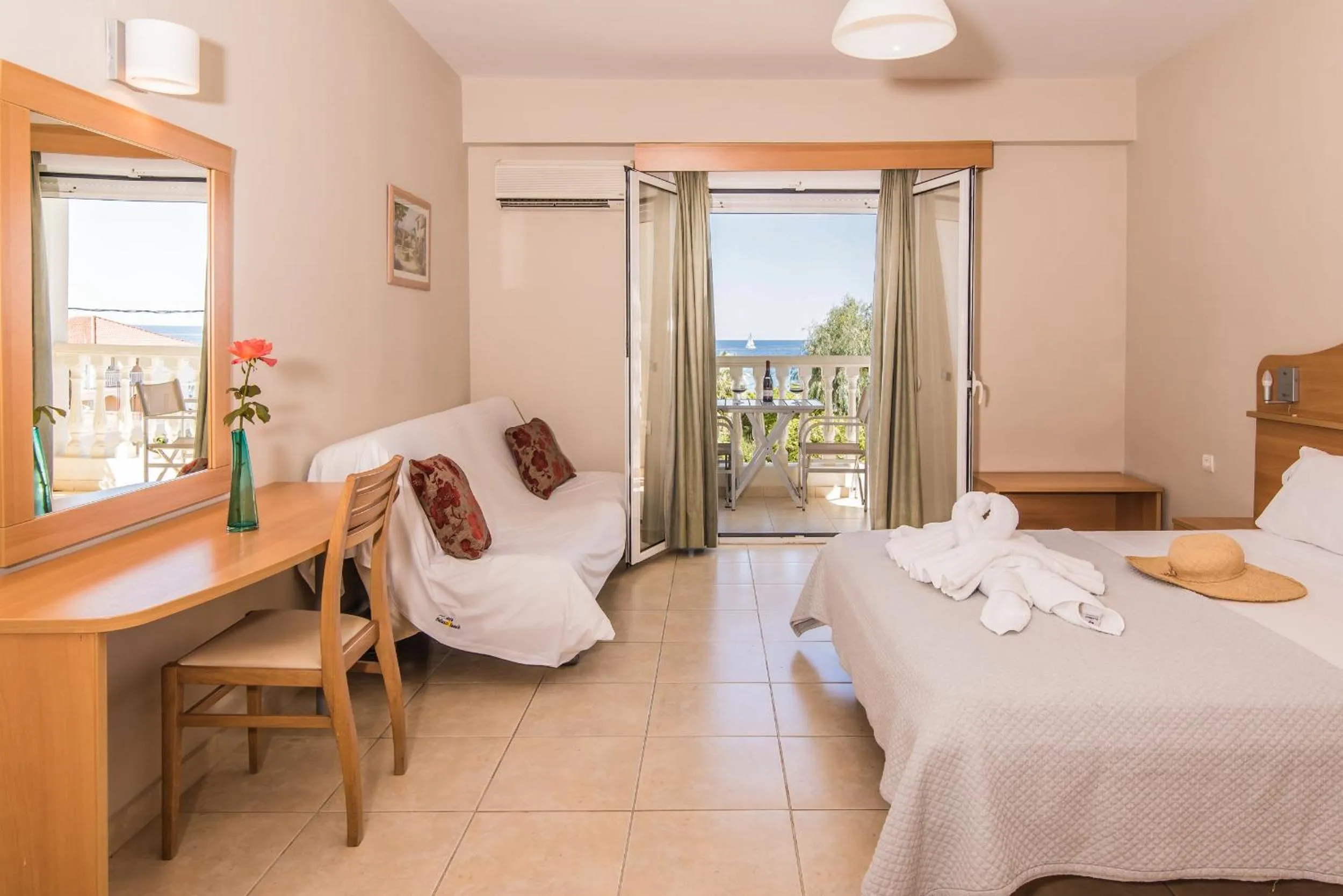 Bedroom in Belussi Beach Hotel & Suites