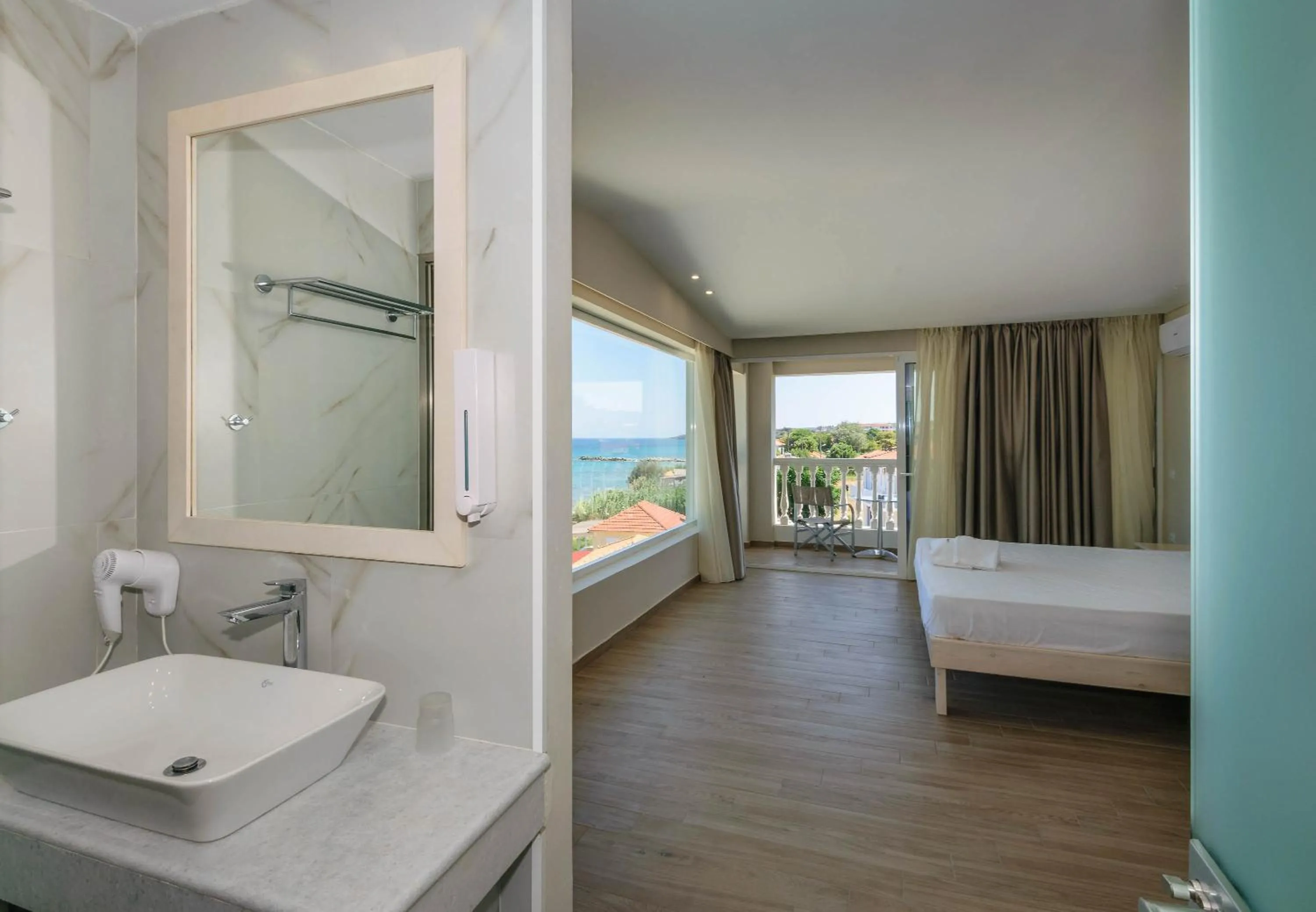 Bathroom in Belussi Beach Hotel & Suites