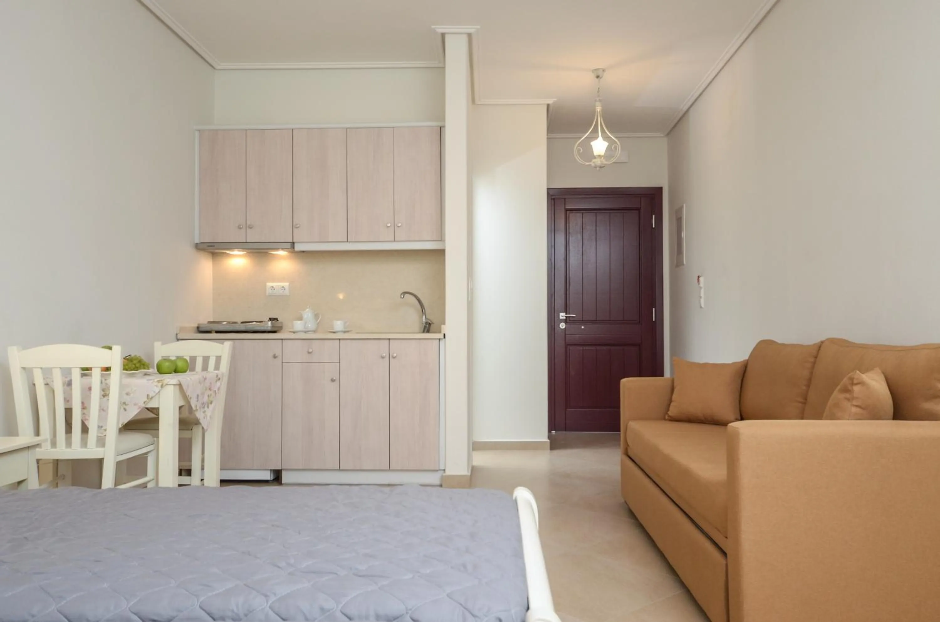 Kitchen or kitchenette in Perla Hotel