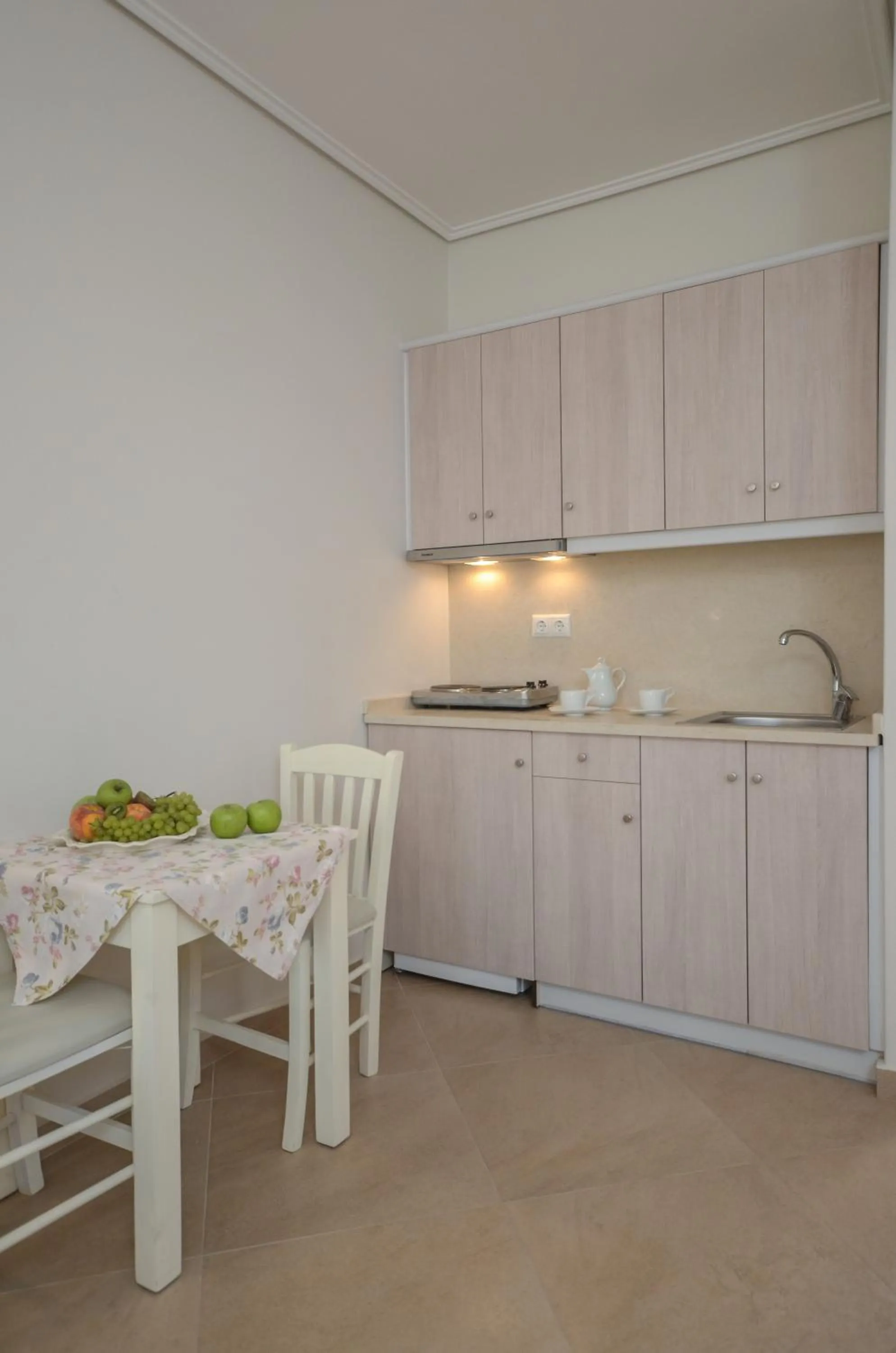 Kitchen or kitchenette in Perla Hotel