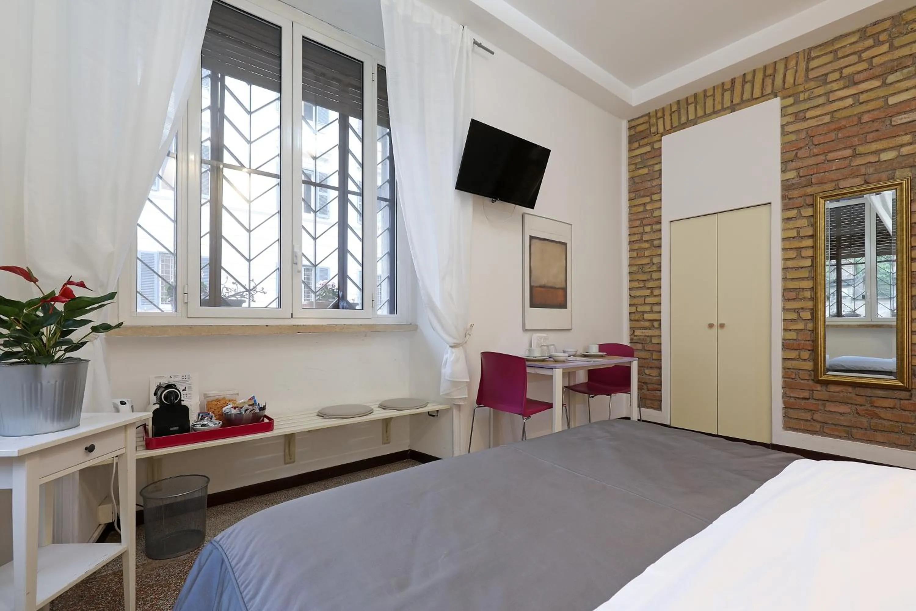 Bed in Maison Colosseo (Via dei Querceti 24)