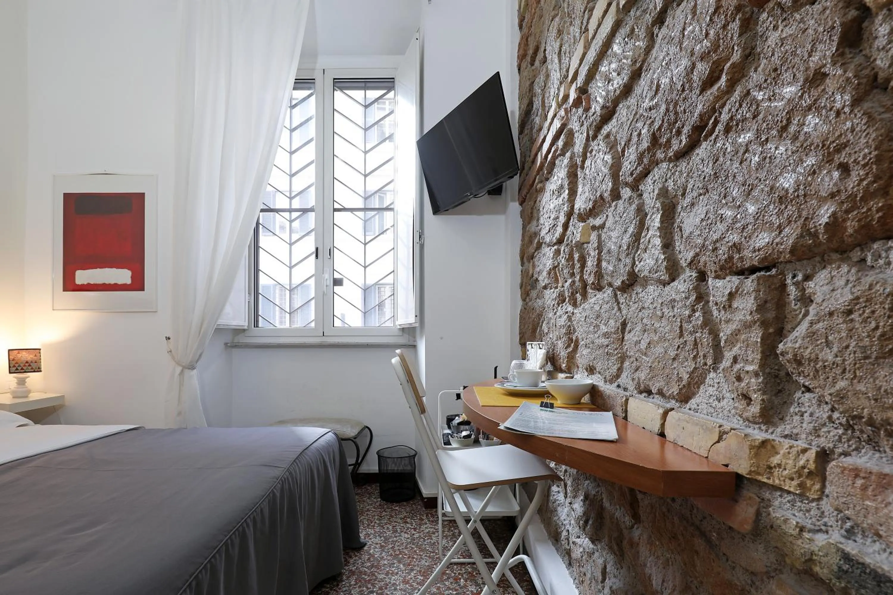 Bed in Maison Colosseo (Via dei Querceti 24)