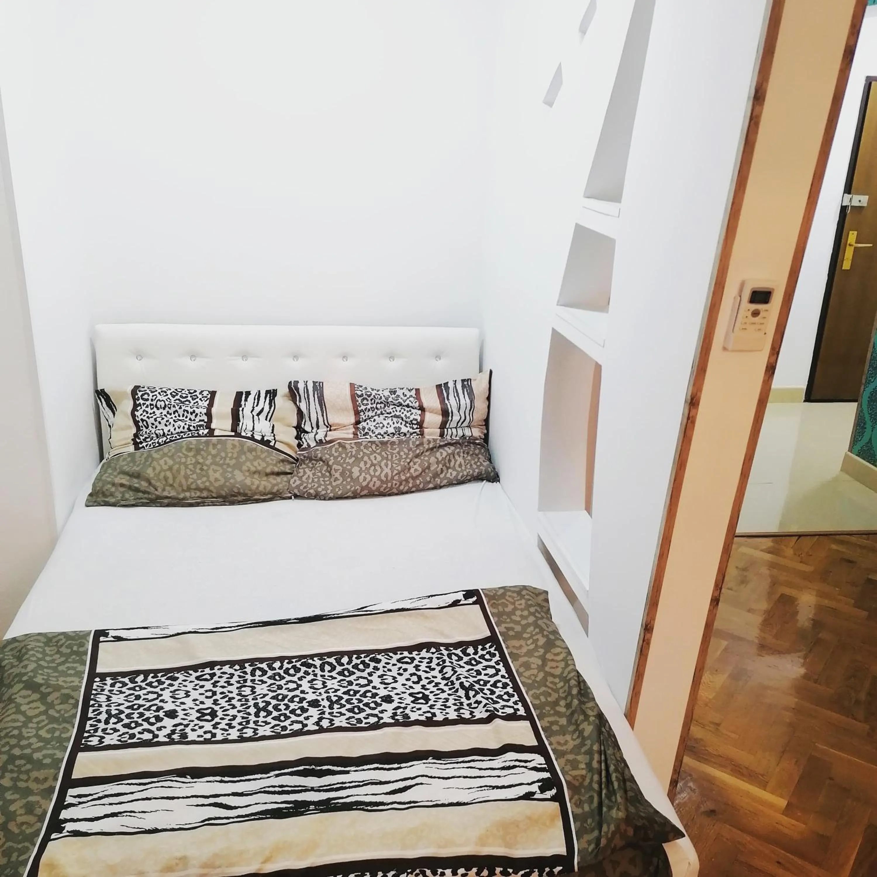 Bed in Marina Jacuzzi Apartment free parking