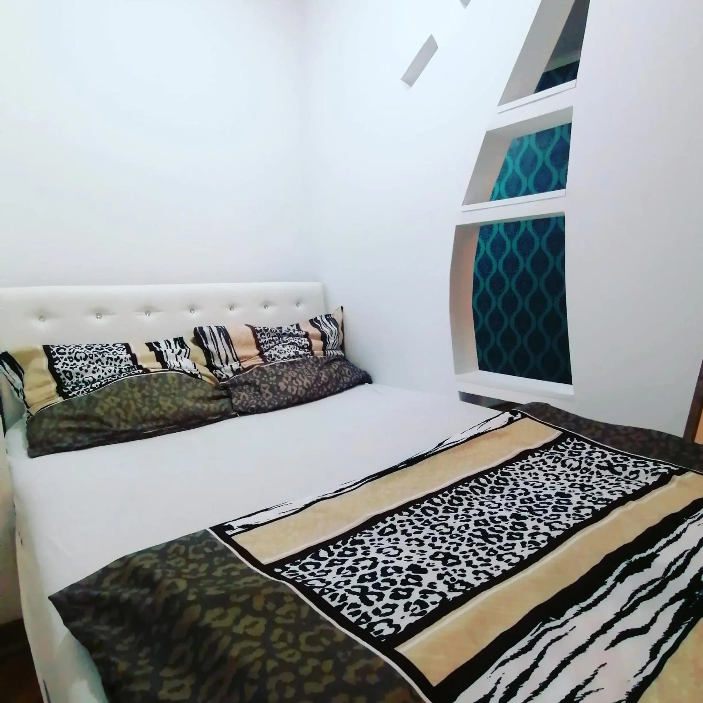 Bed in Marina Jacuzzi Apartment free parking
