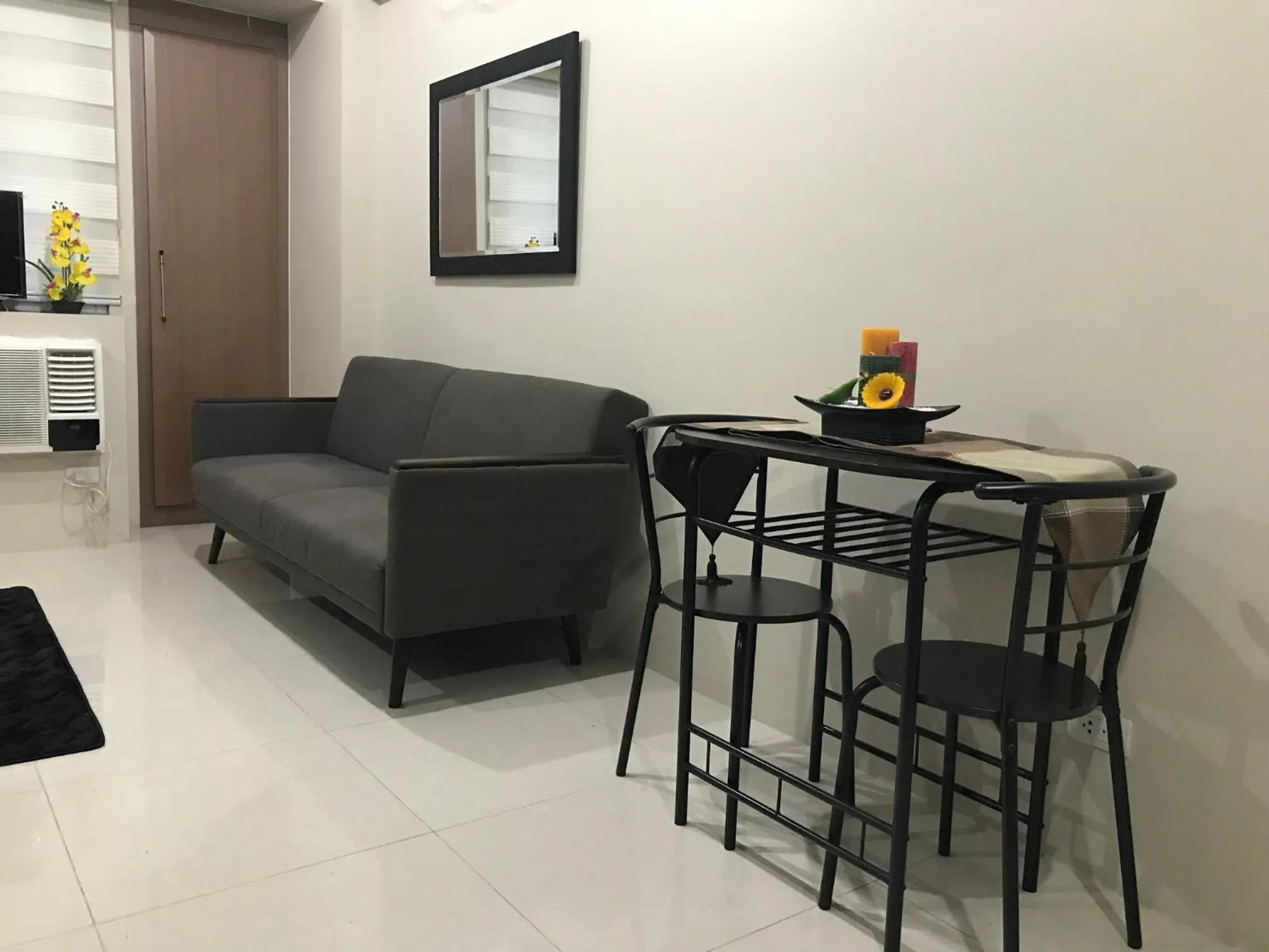 Living room in One Palm Tree Apartments