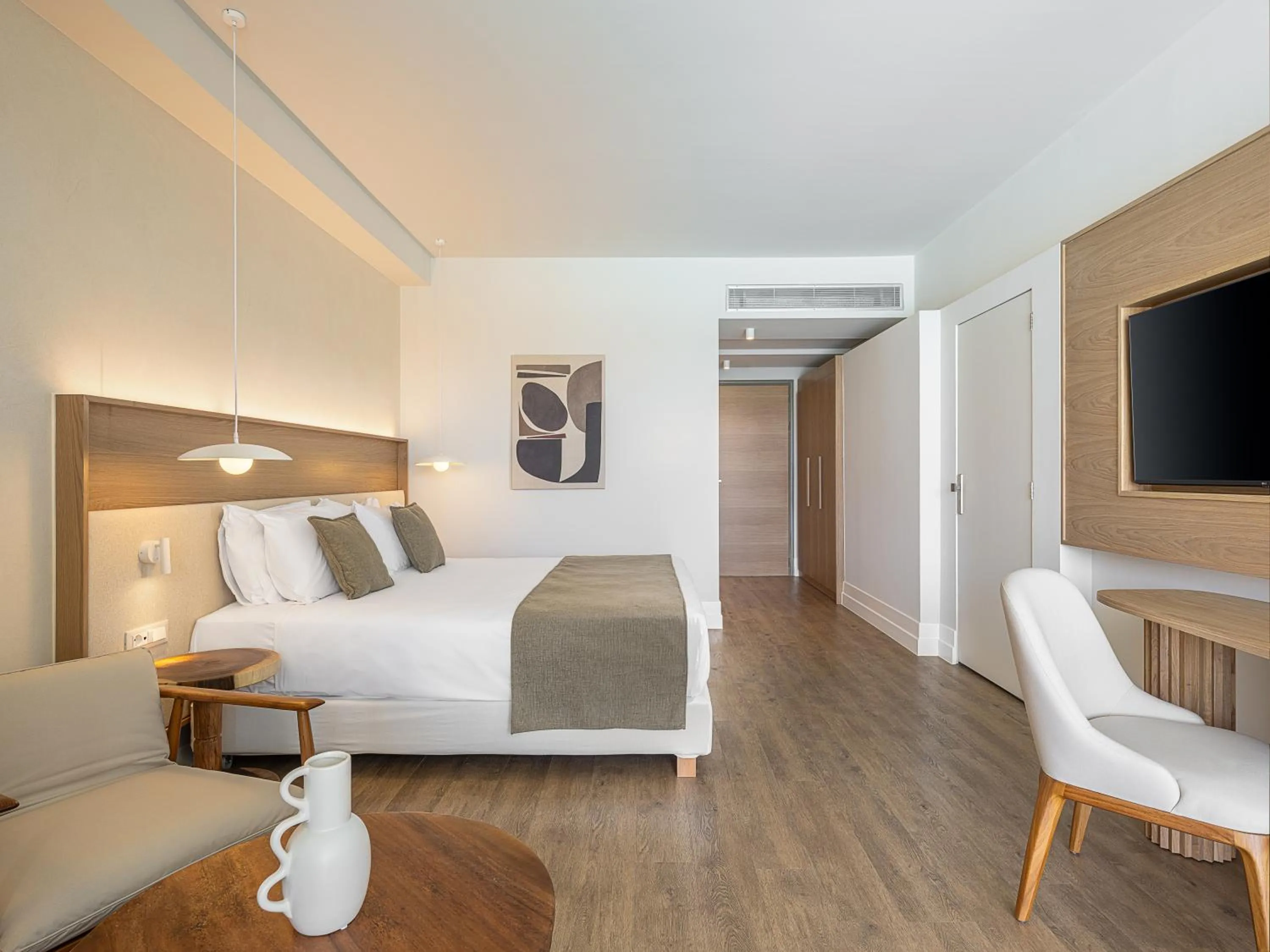 Bed in Avra Imperial Hotel