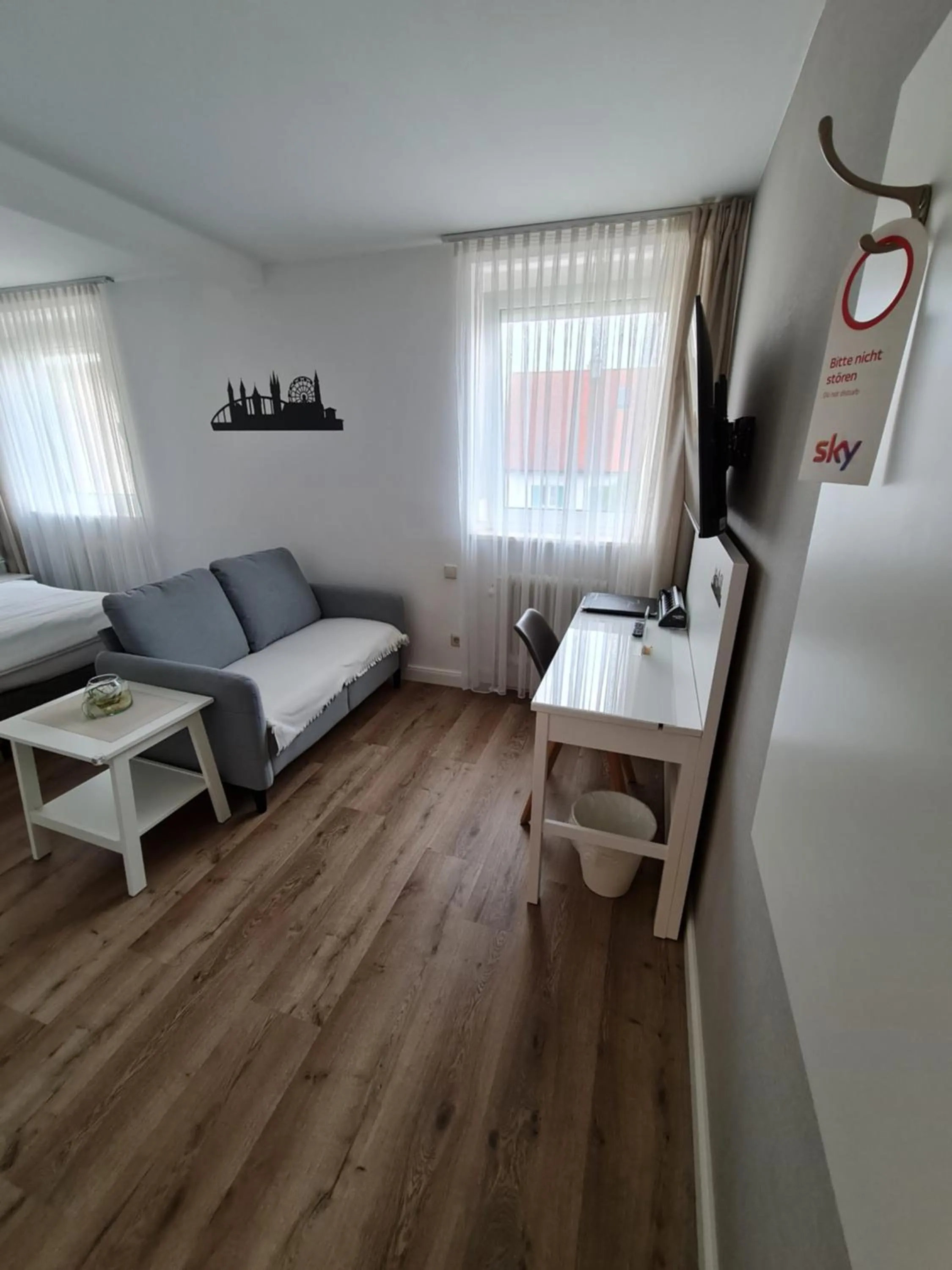 Seating area, Bed in City Hotel Franziska