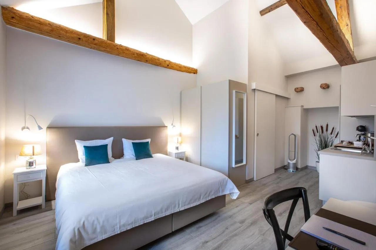 Bed in Auberge des Grands Bois