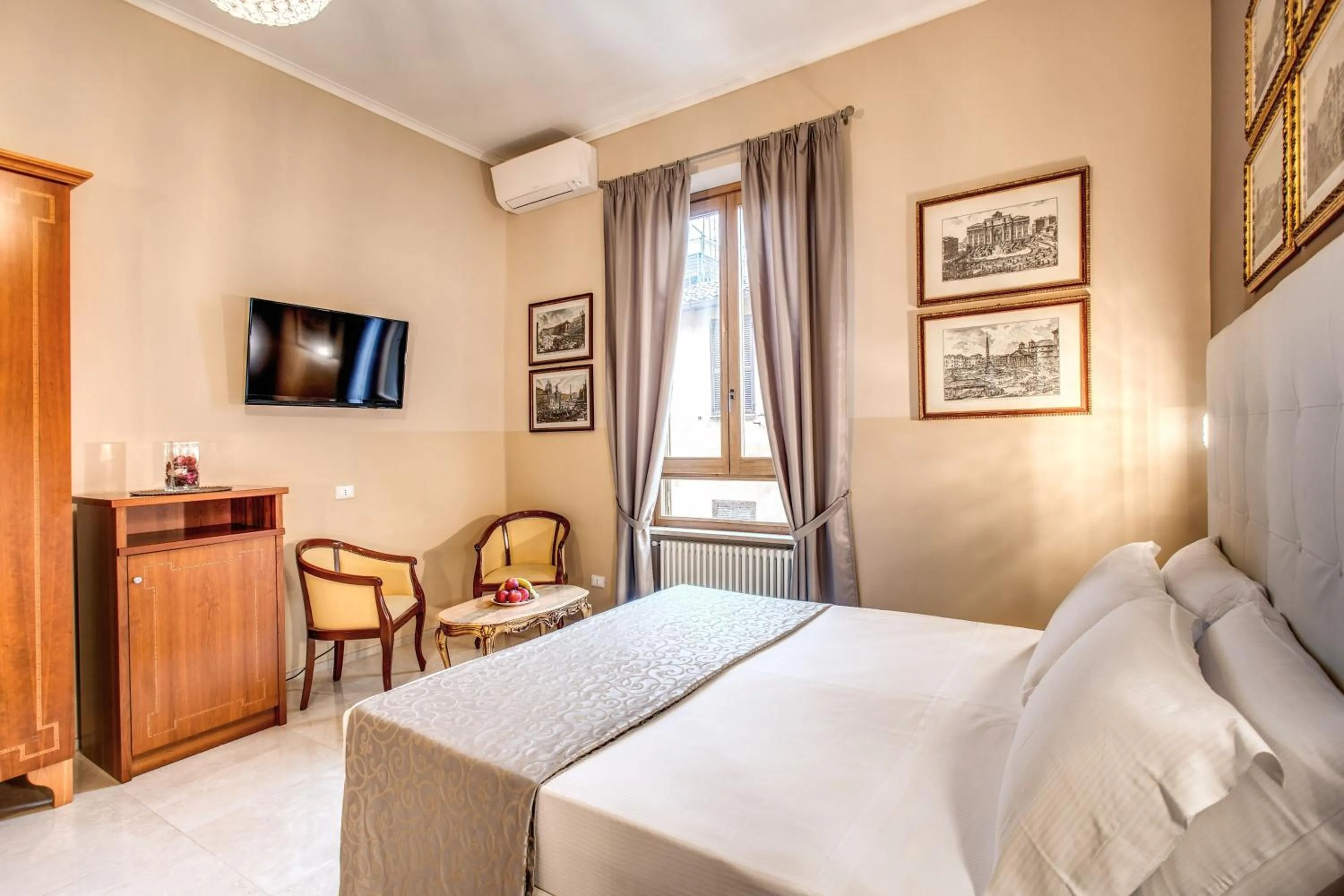 Bed in La Residenza Suites