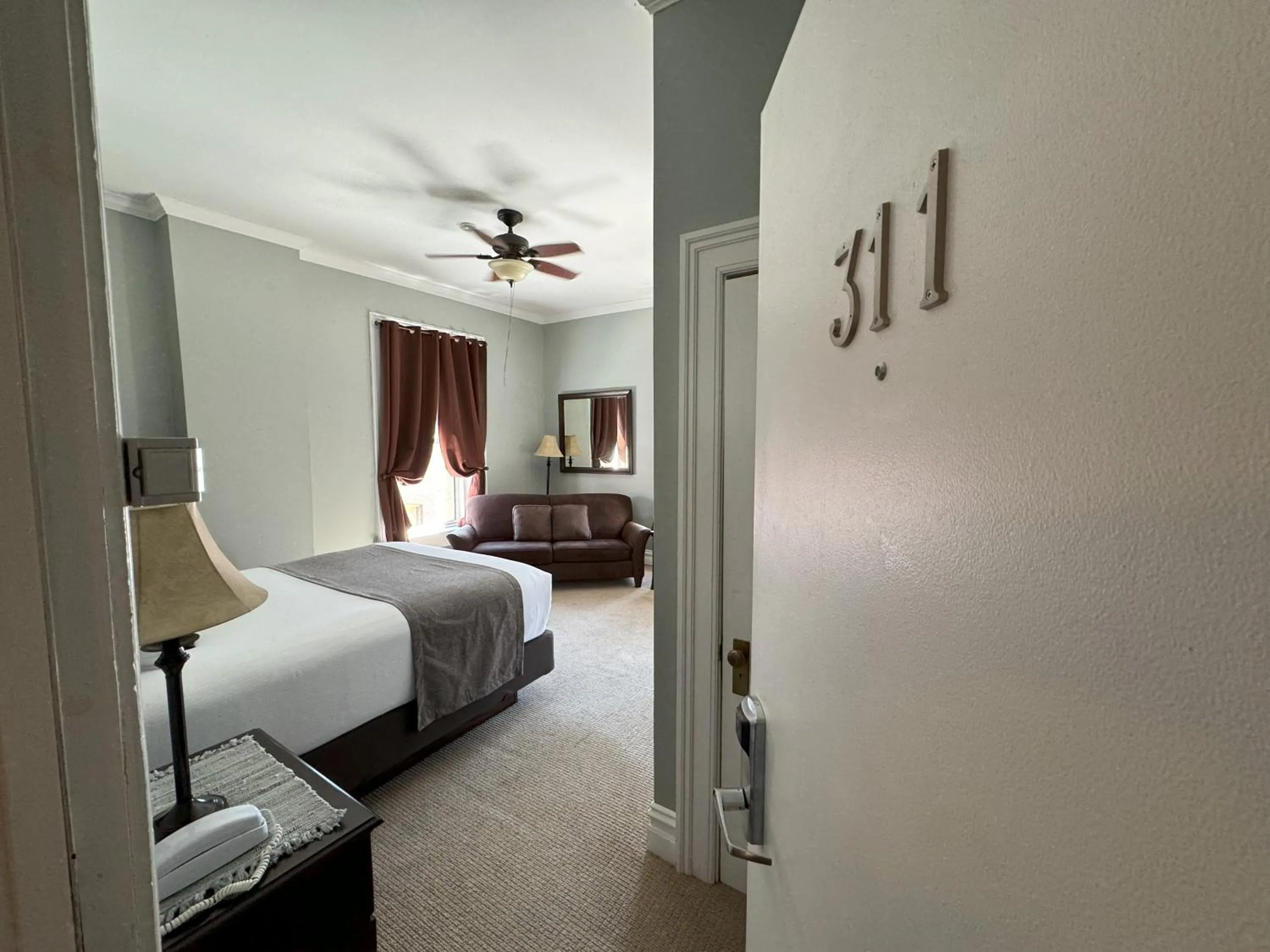 Bed in The Continental Hotel