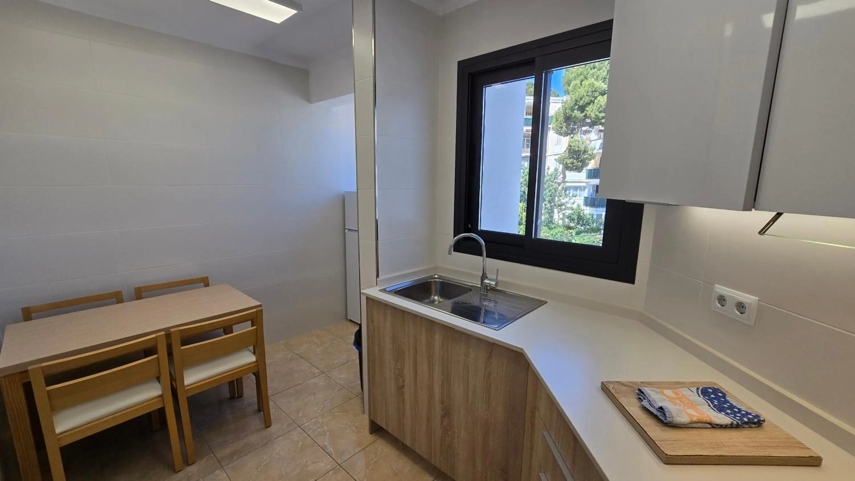 Kitchen or kitchenette in Marina Palmanova Apartamentos