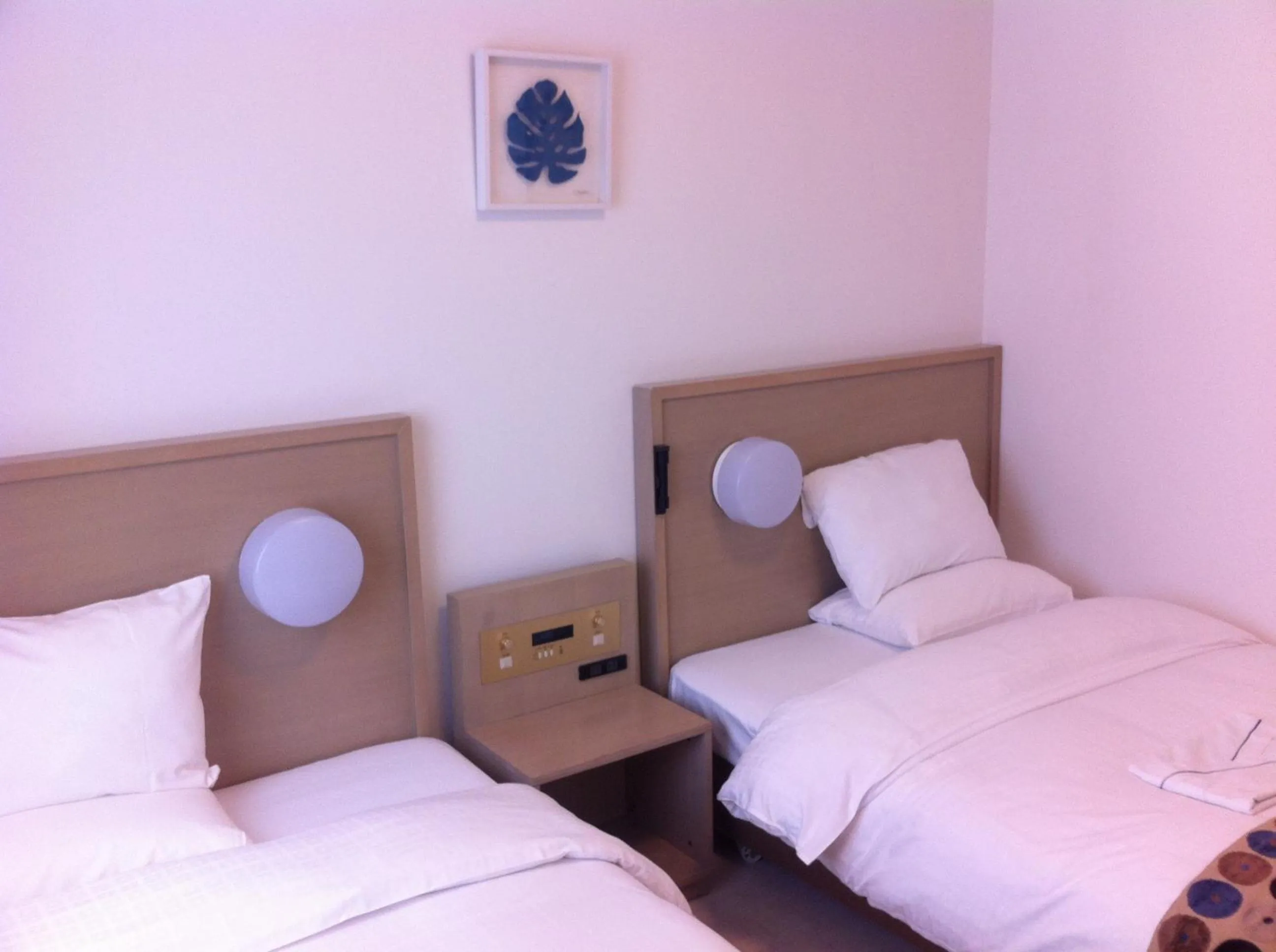 Bed in Smile Hotel Okinawa Naha (Tomari Port)