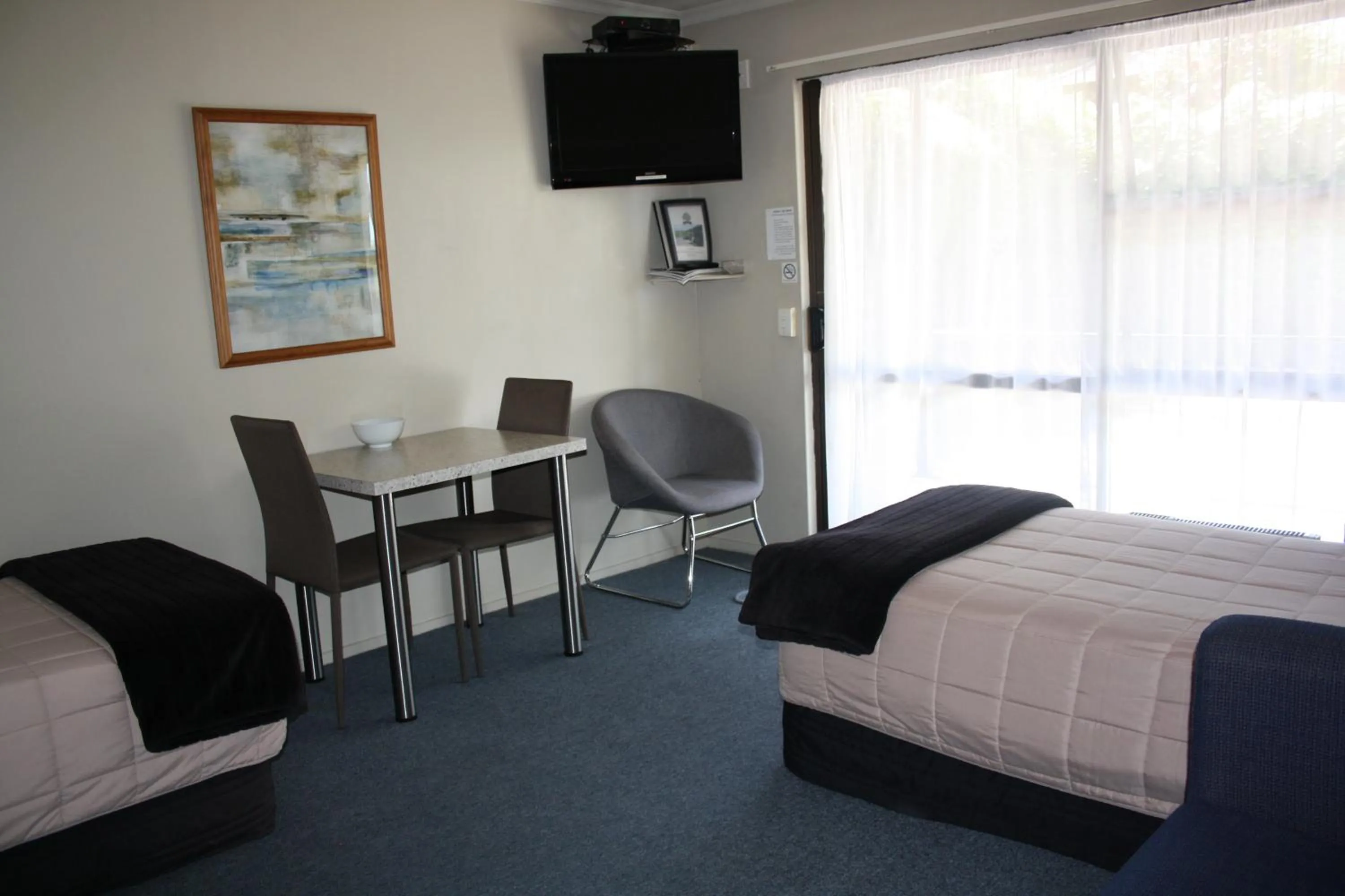 Bed in Ashbury Park Motel