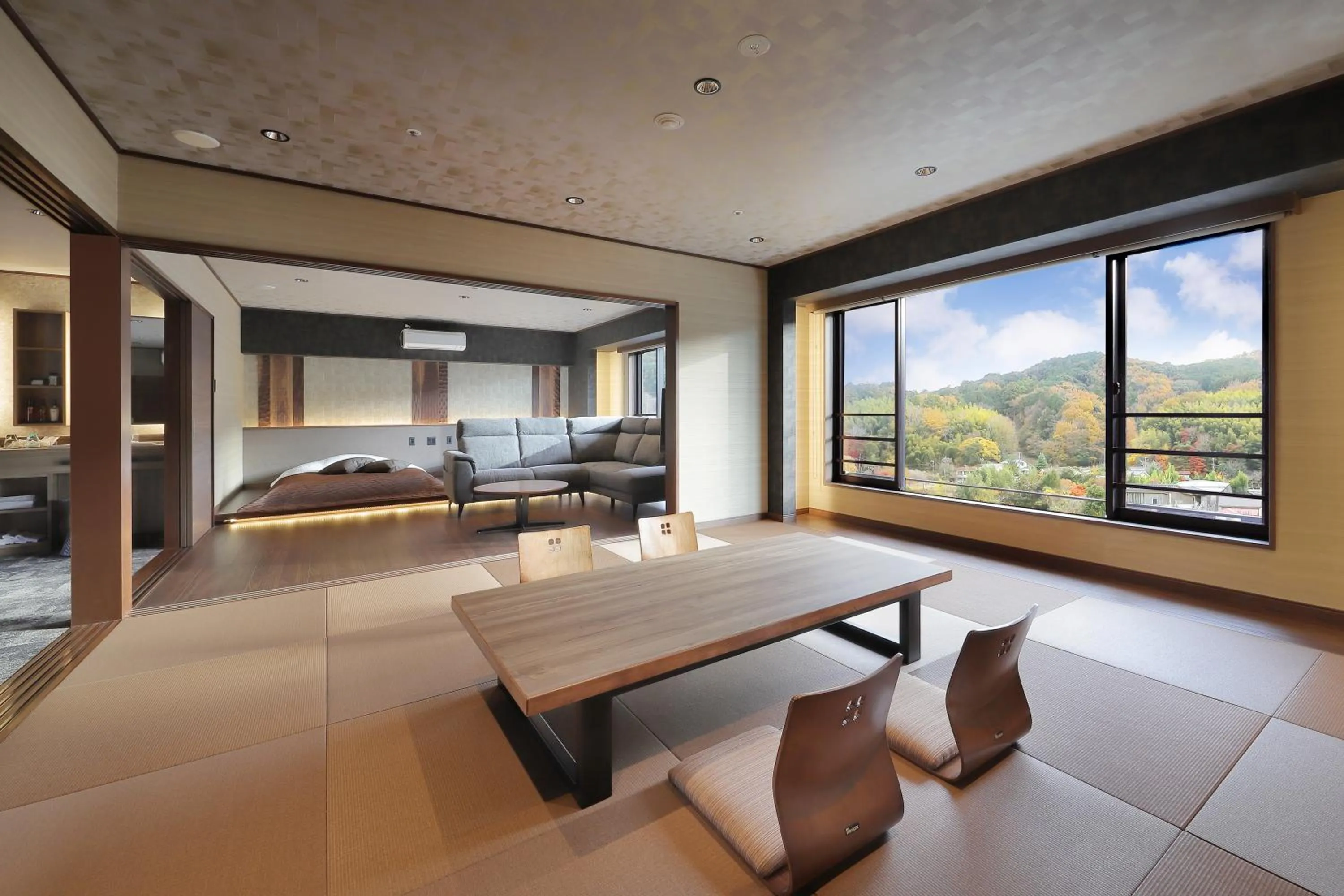 Living room, Bed in Marukyu Ryokan