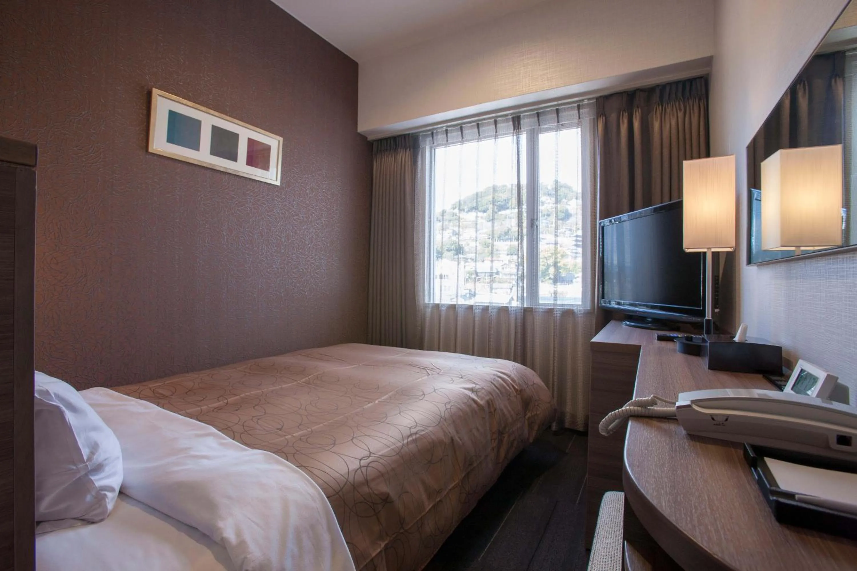 Photo of the whole room, Bed in Onomichi Royal Hotel