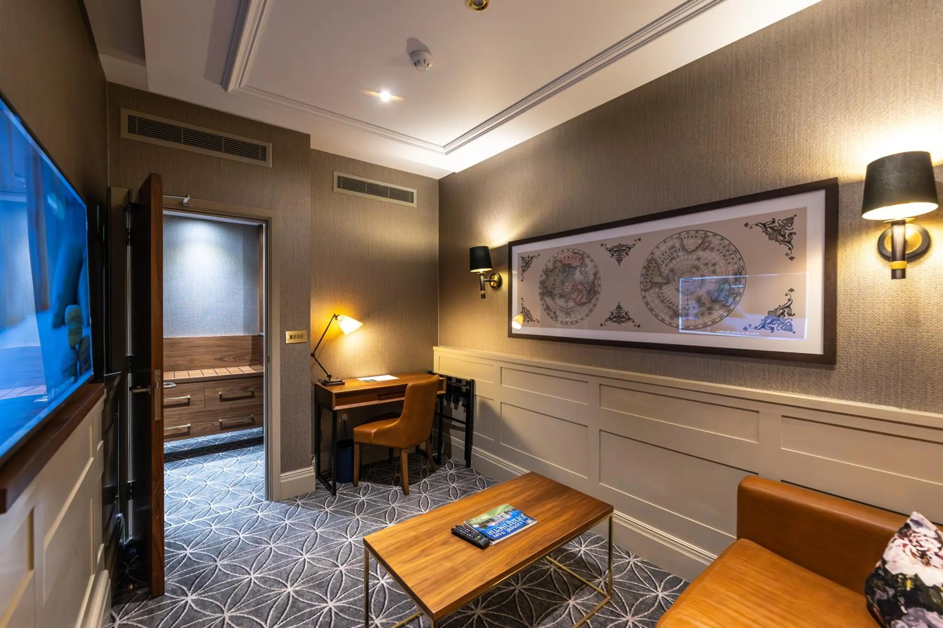 Seating area in 100 Queen's Gate Hotel London Kensington, Curio Collection by Hilton