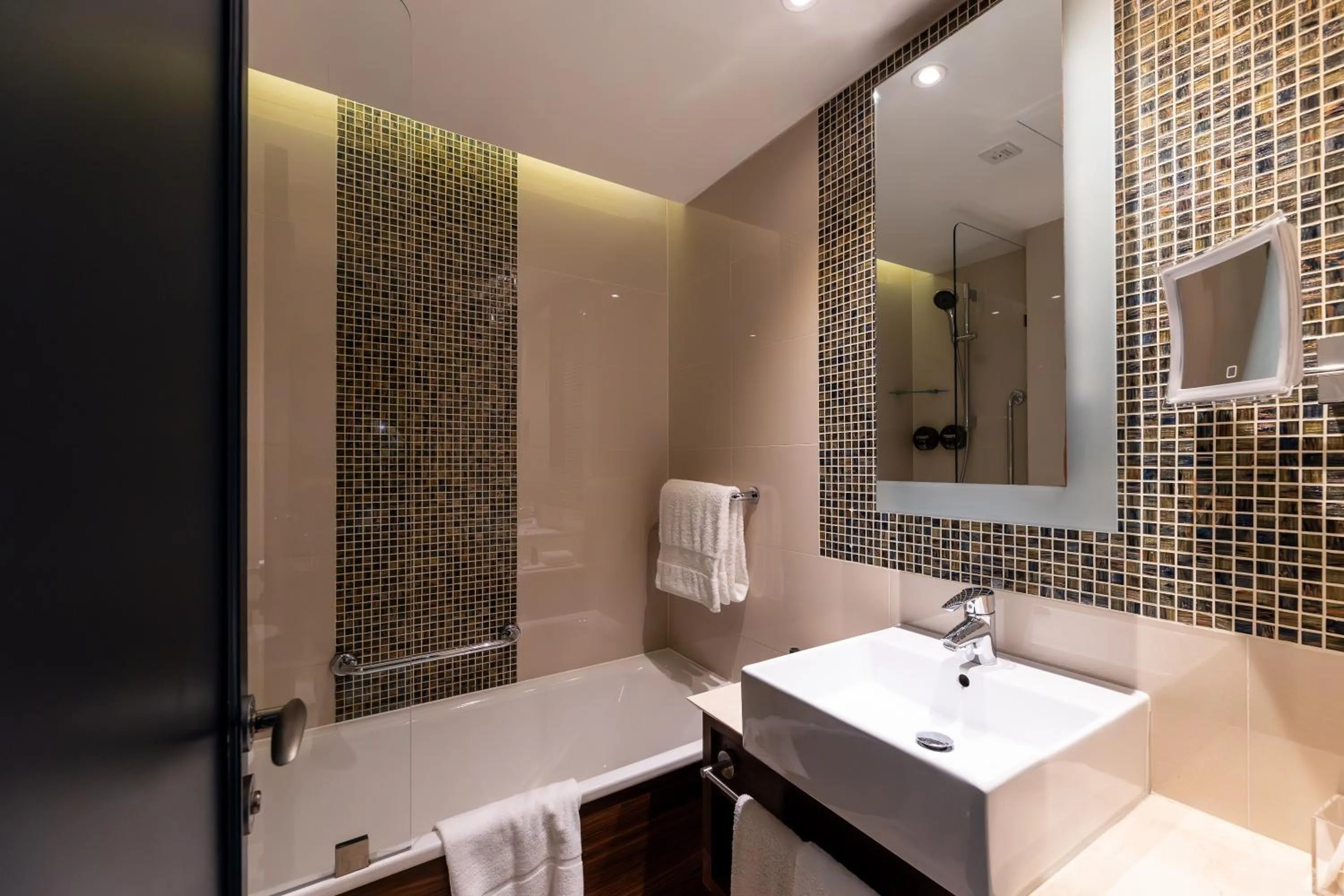 Bathroom in 100 Queen's Gate Hotel London Kensington, Curio Collection by Hilton