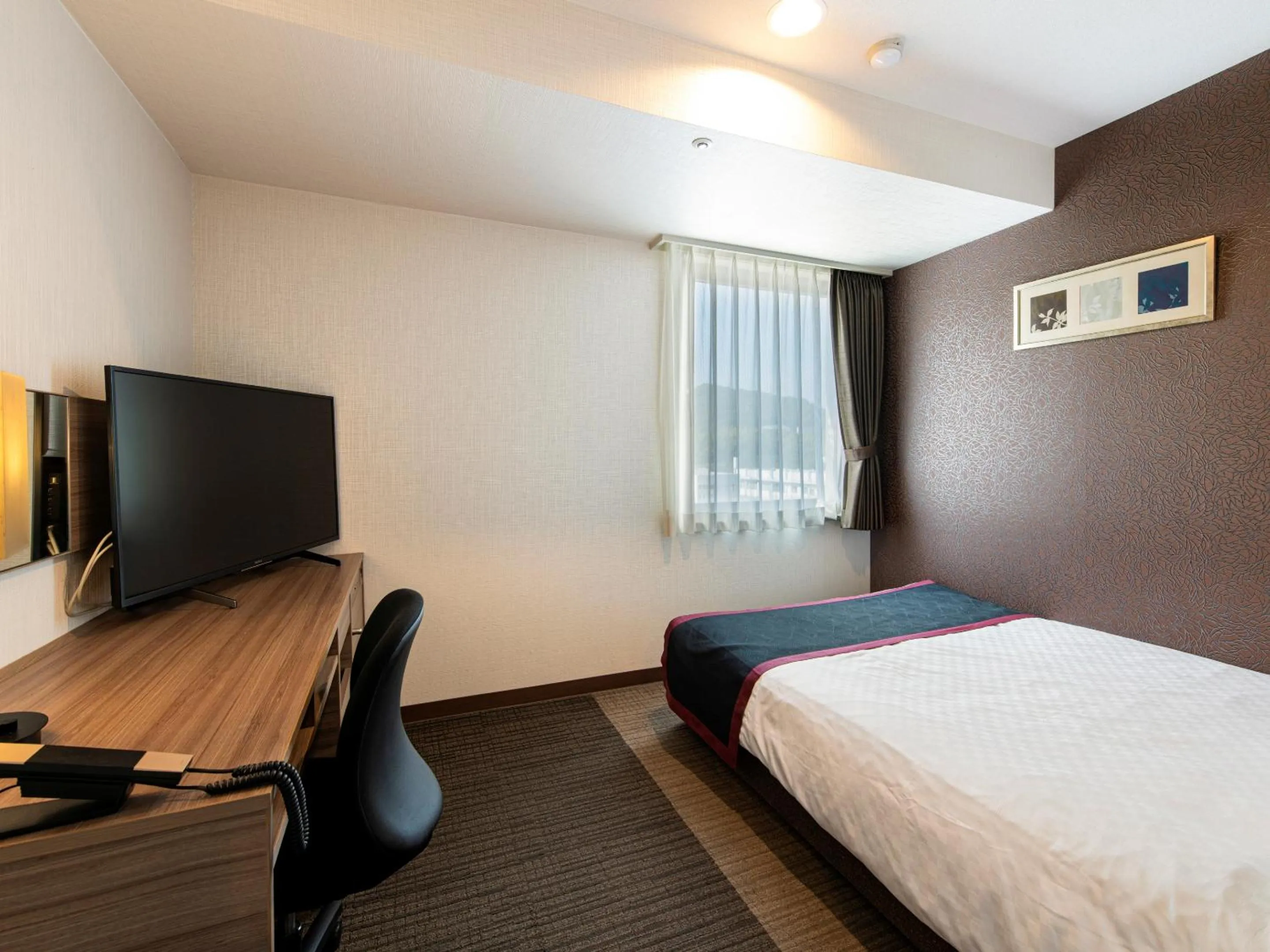 Photo of the whole room, Bed in Onomichi Kokusai Hotel