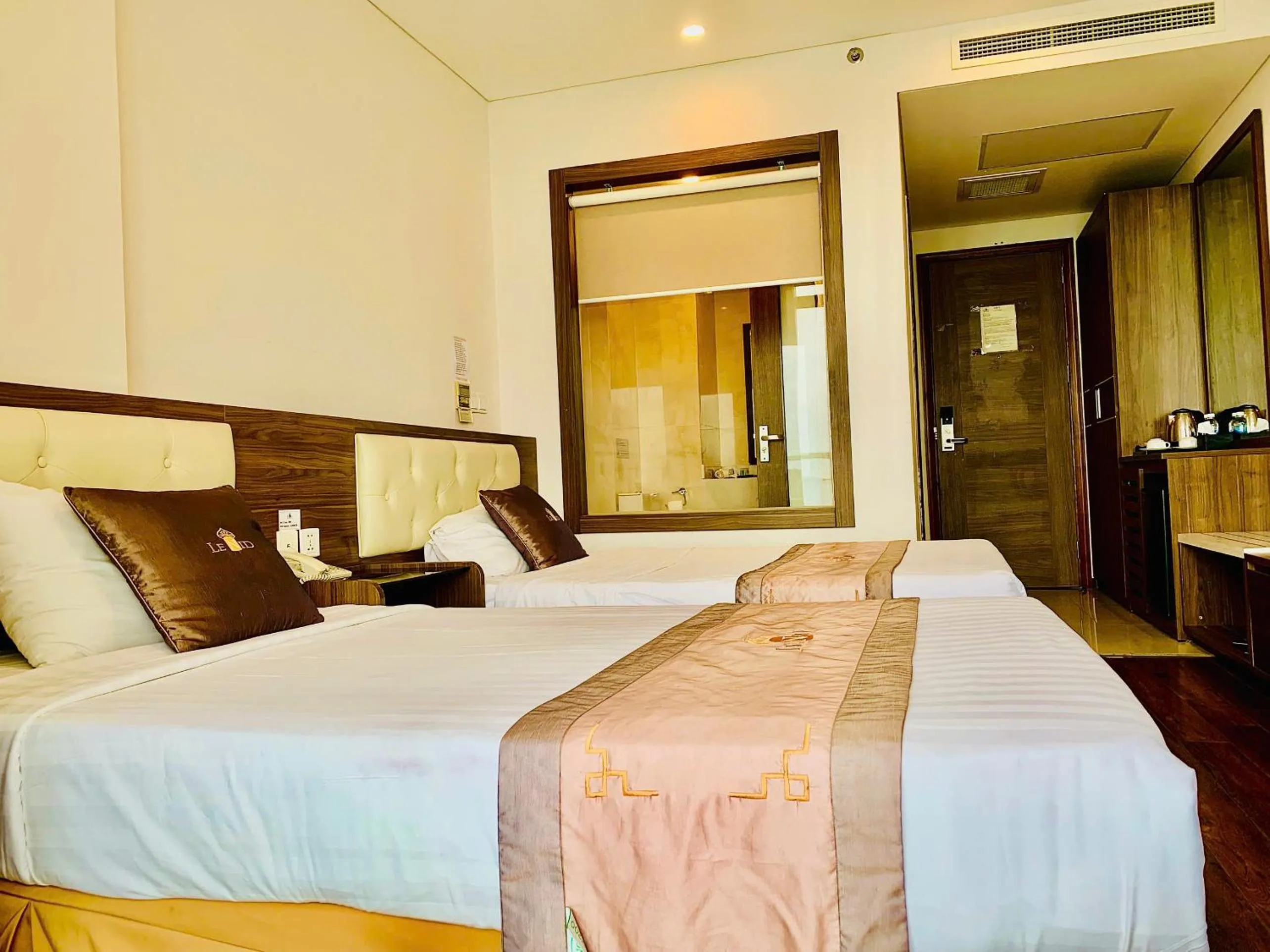 Bed in Lenid Ocean View Hotel