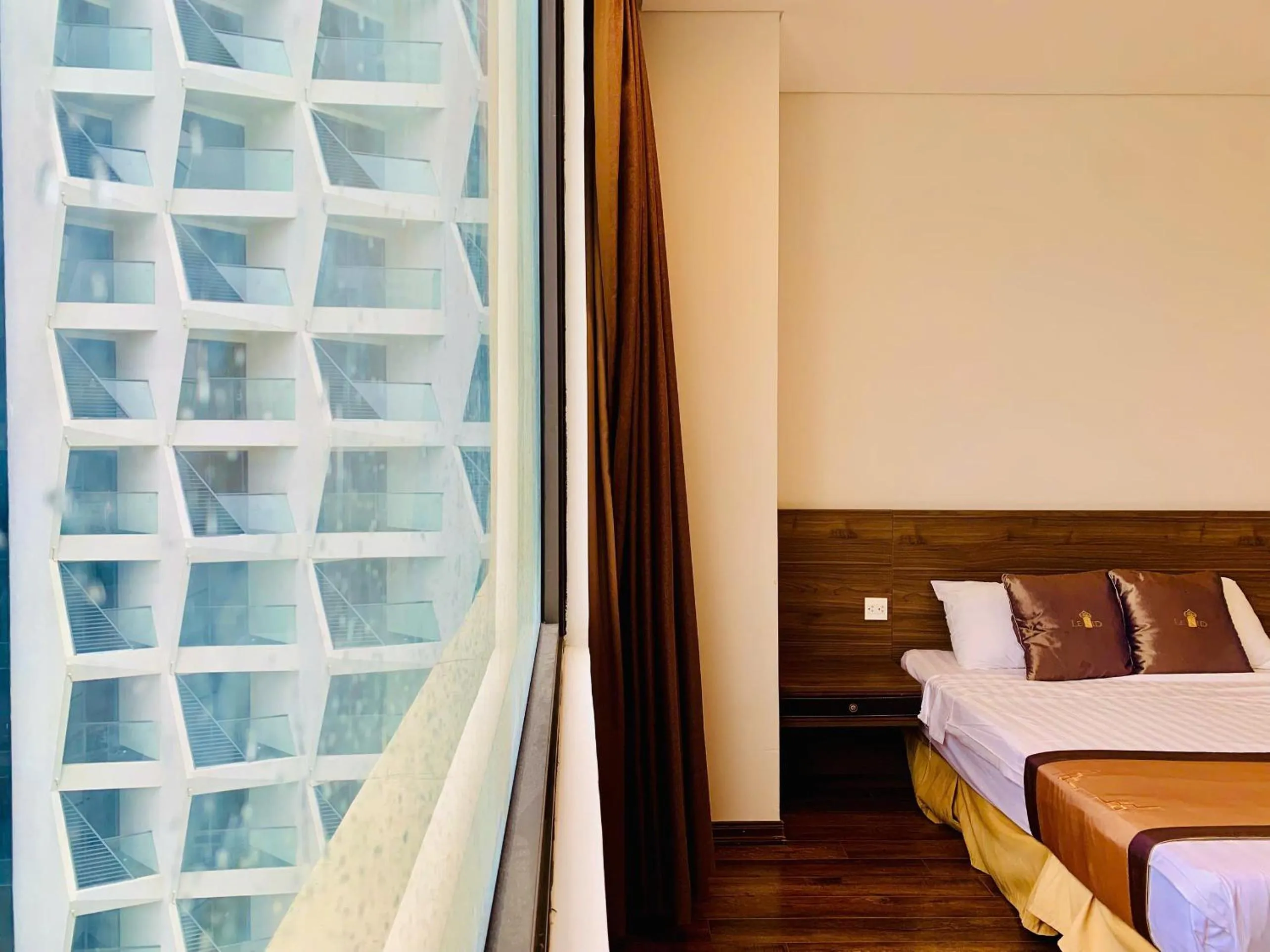 Bed in Lenid Ocean View Hotel