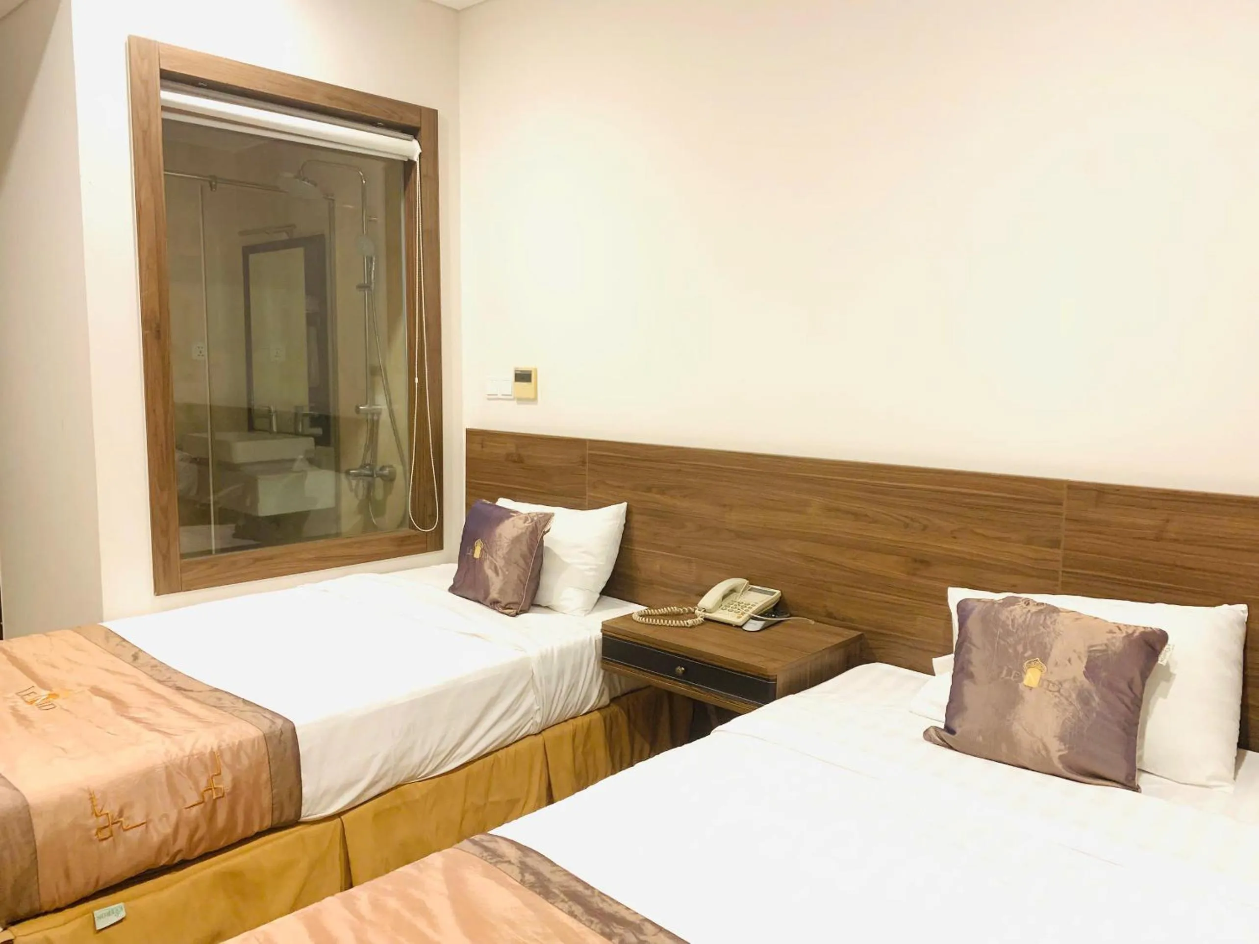 Bed in Lenid Ocean View Hotel