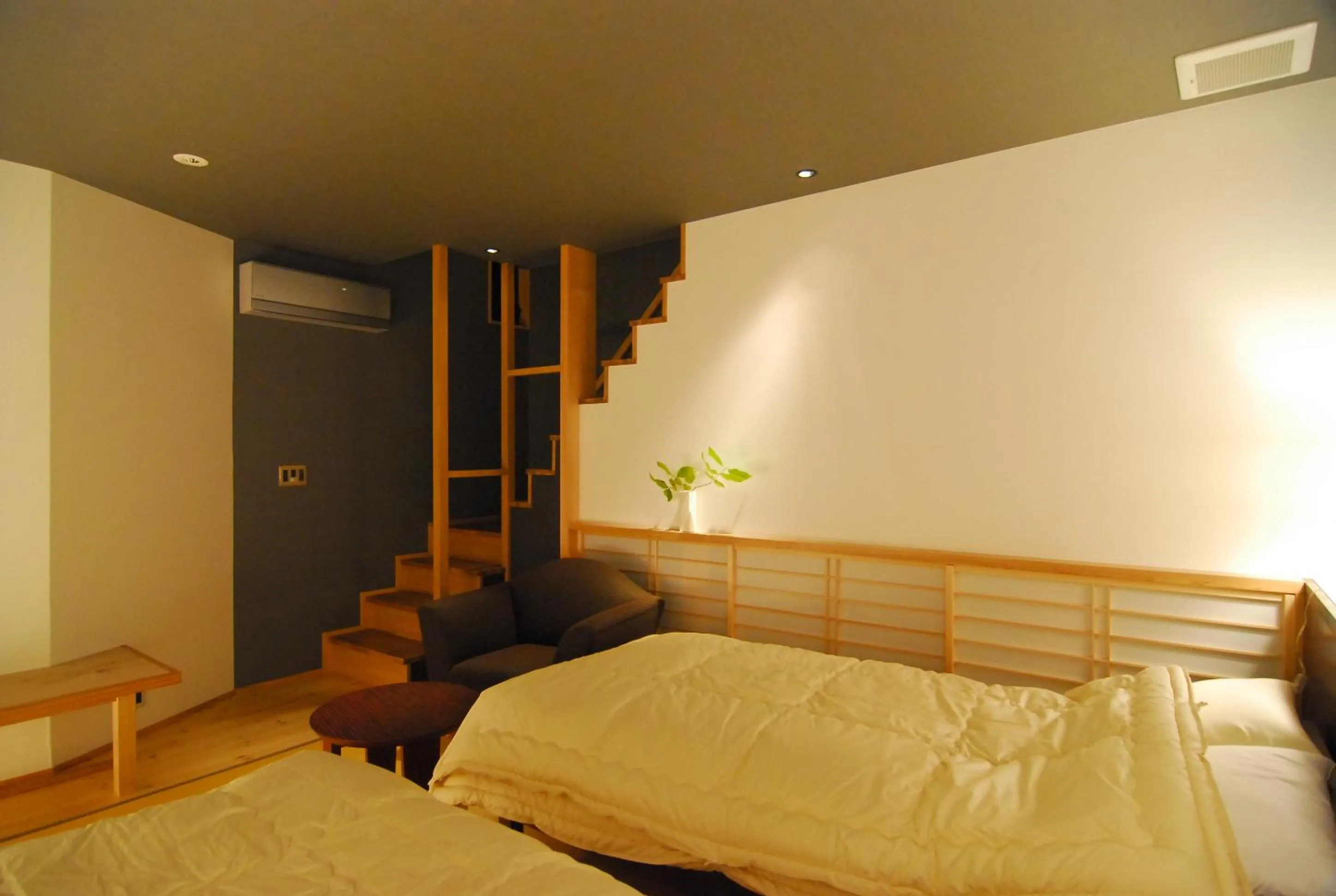 Photo of the whole room, Bed in AKARI et KAORI formerly Taizanso