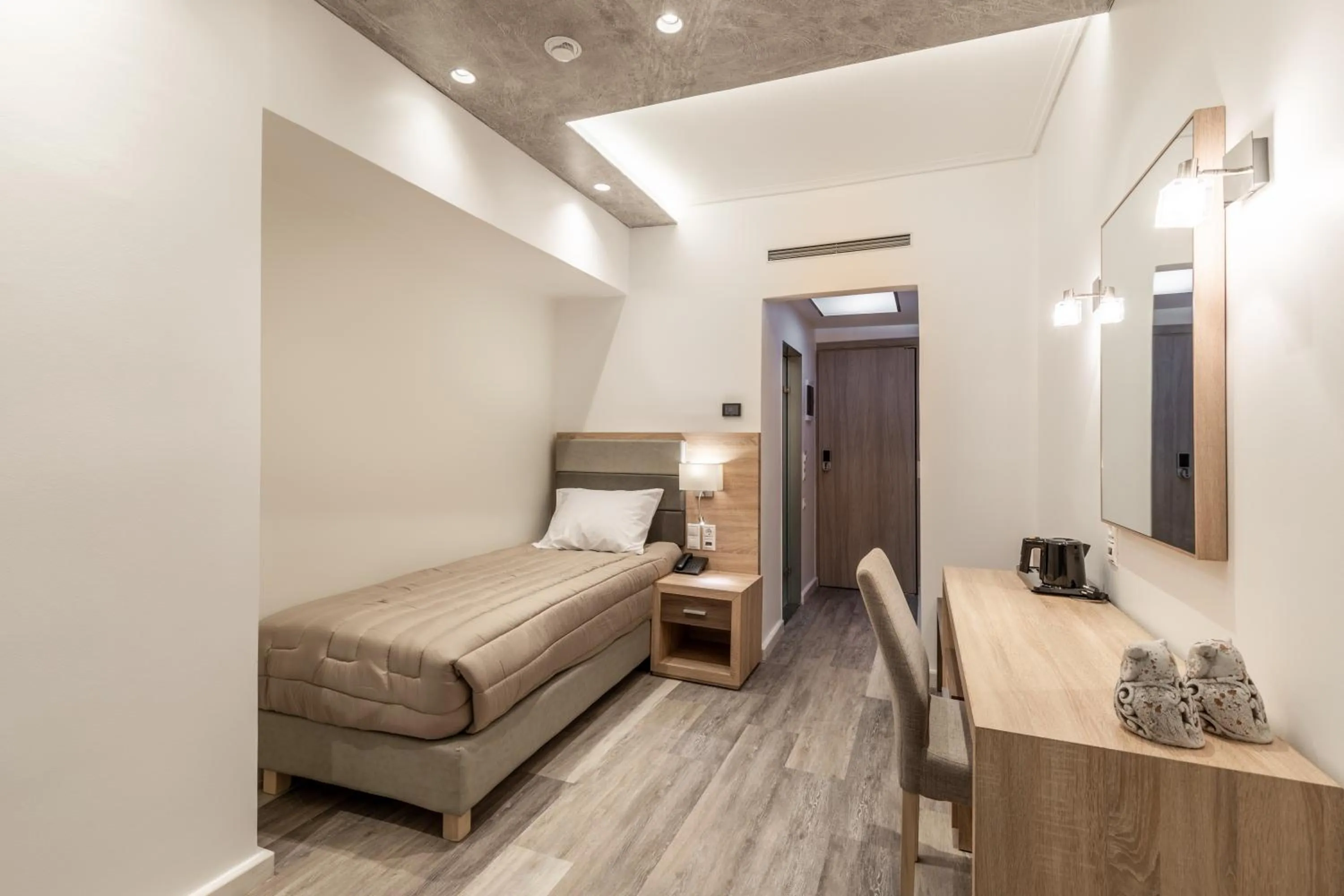 Bed in Xenophon Hotel