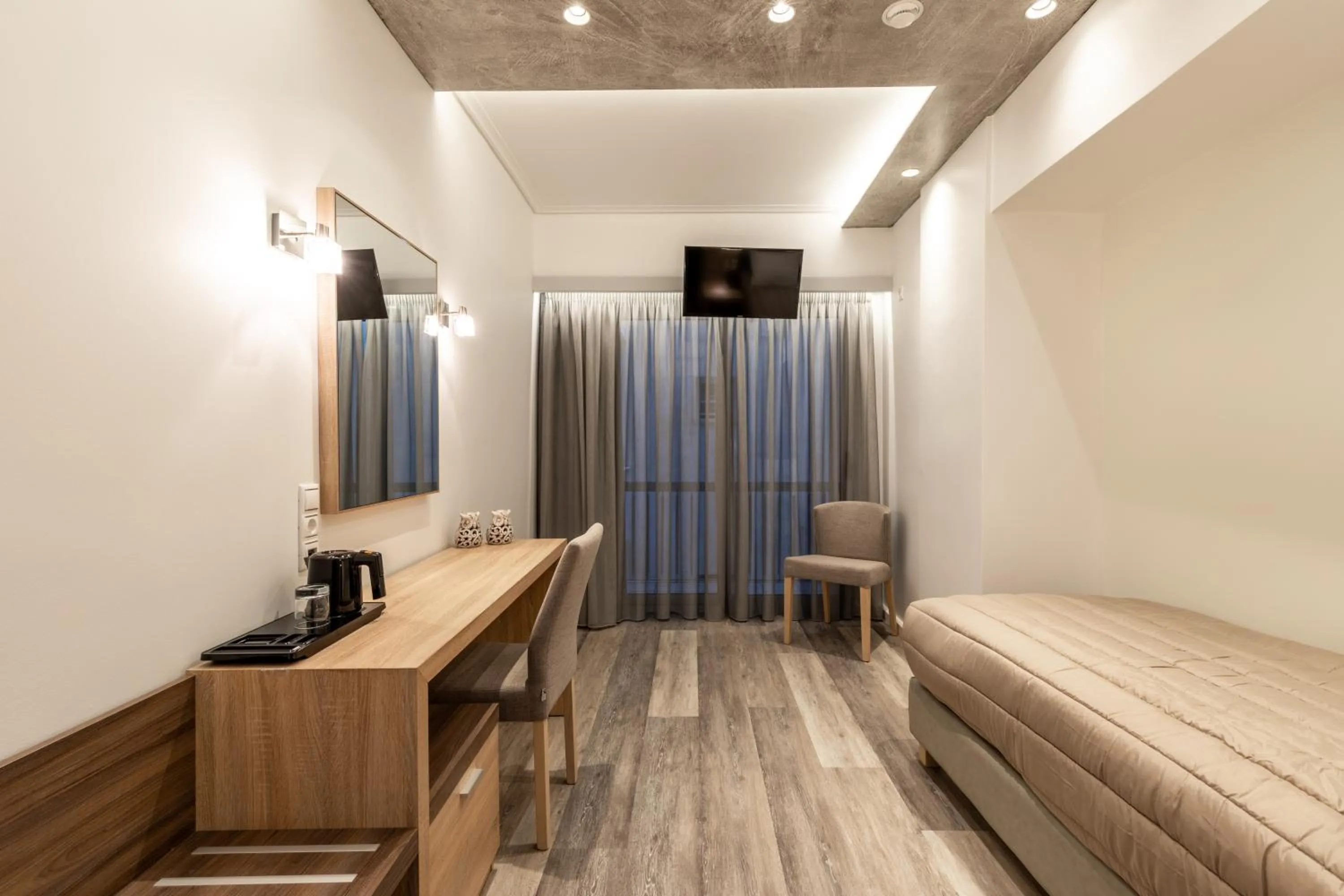 Bed in Xenophon Hotel