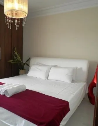 Bed in Arcadia Suites & Spa