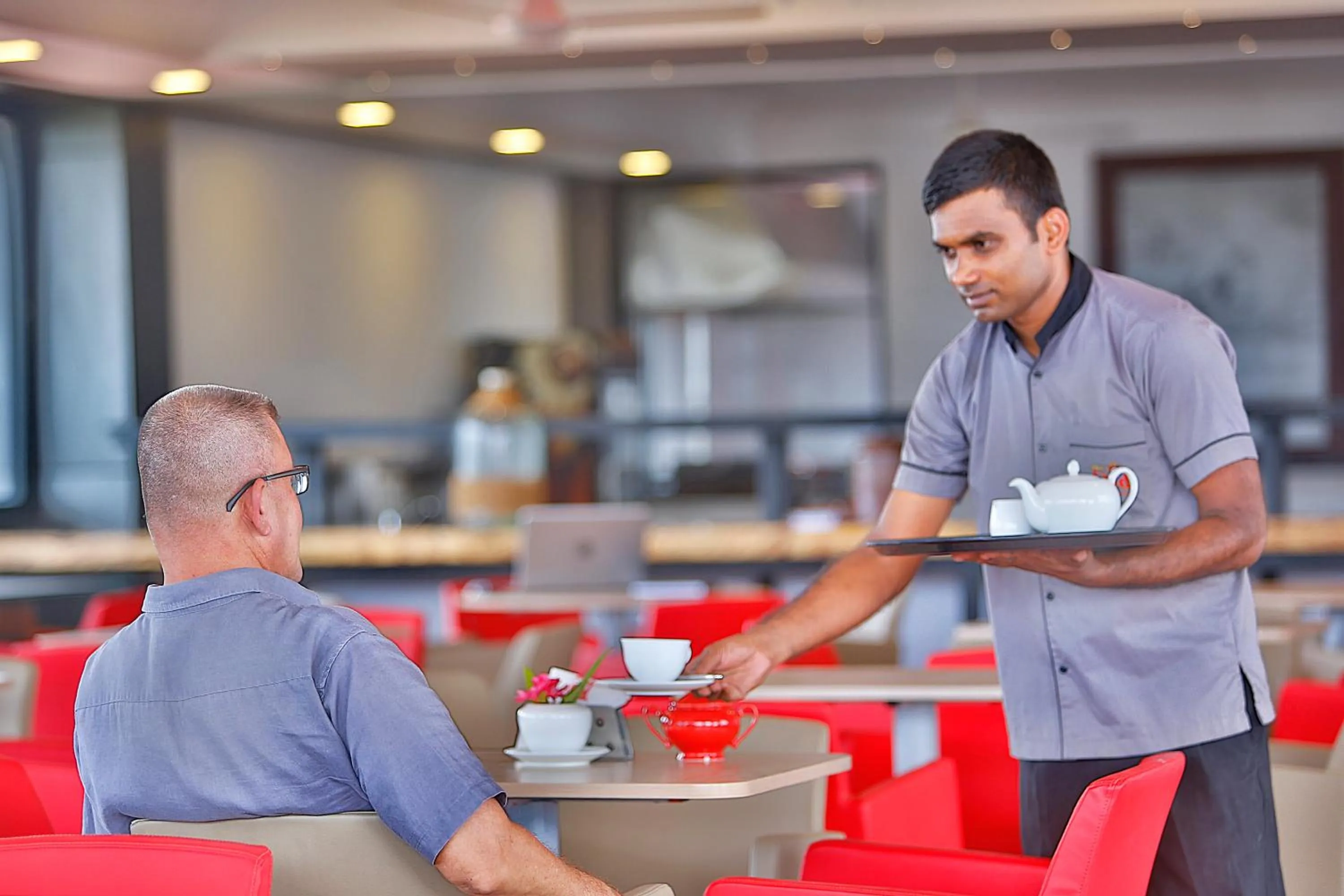 Staff in Earl's Red Colombo