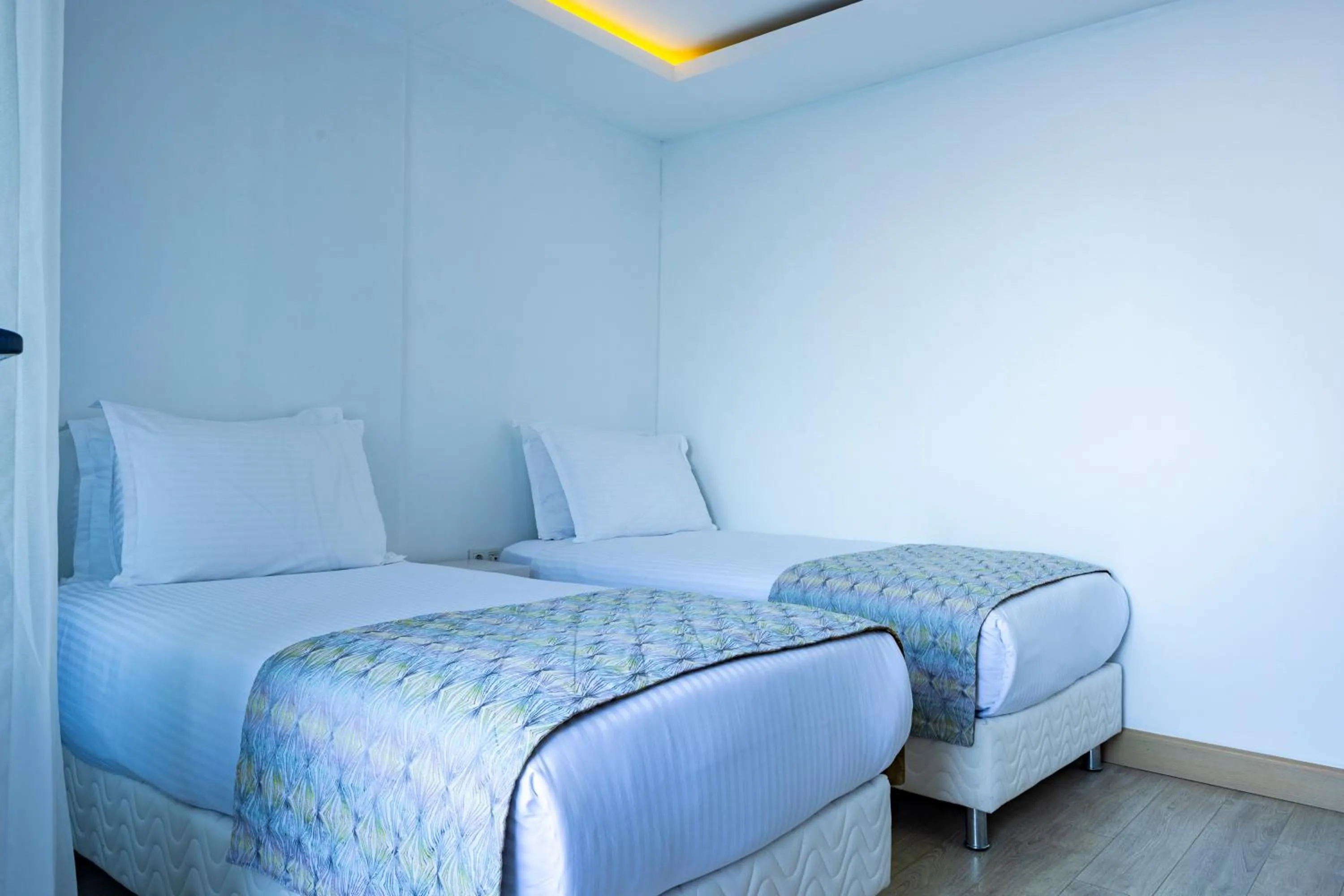 Bed in The Nowness Luxury Hotel & Spa Adulty Only