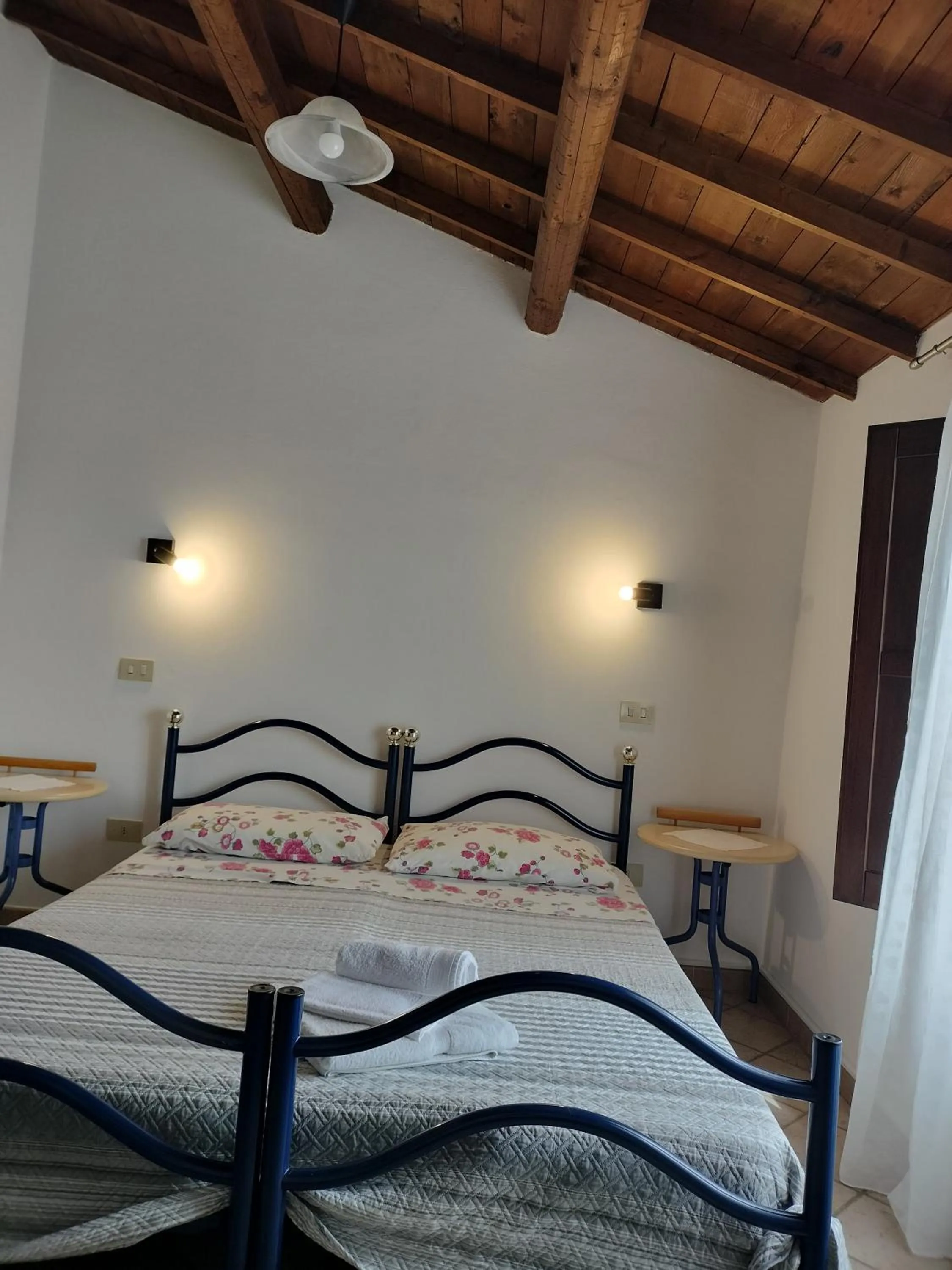 Photo of the whole room, Bed in La Casa Rossa