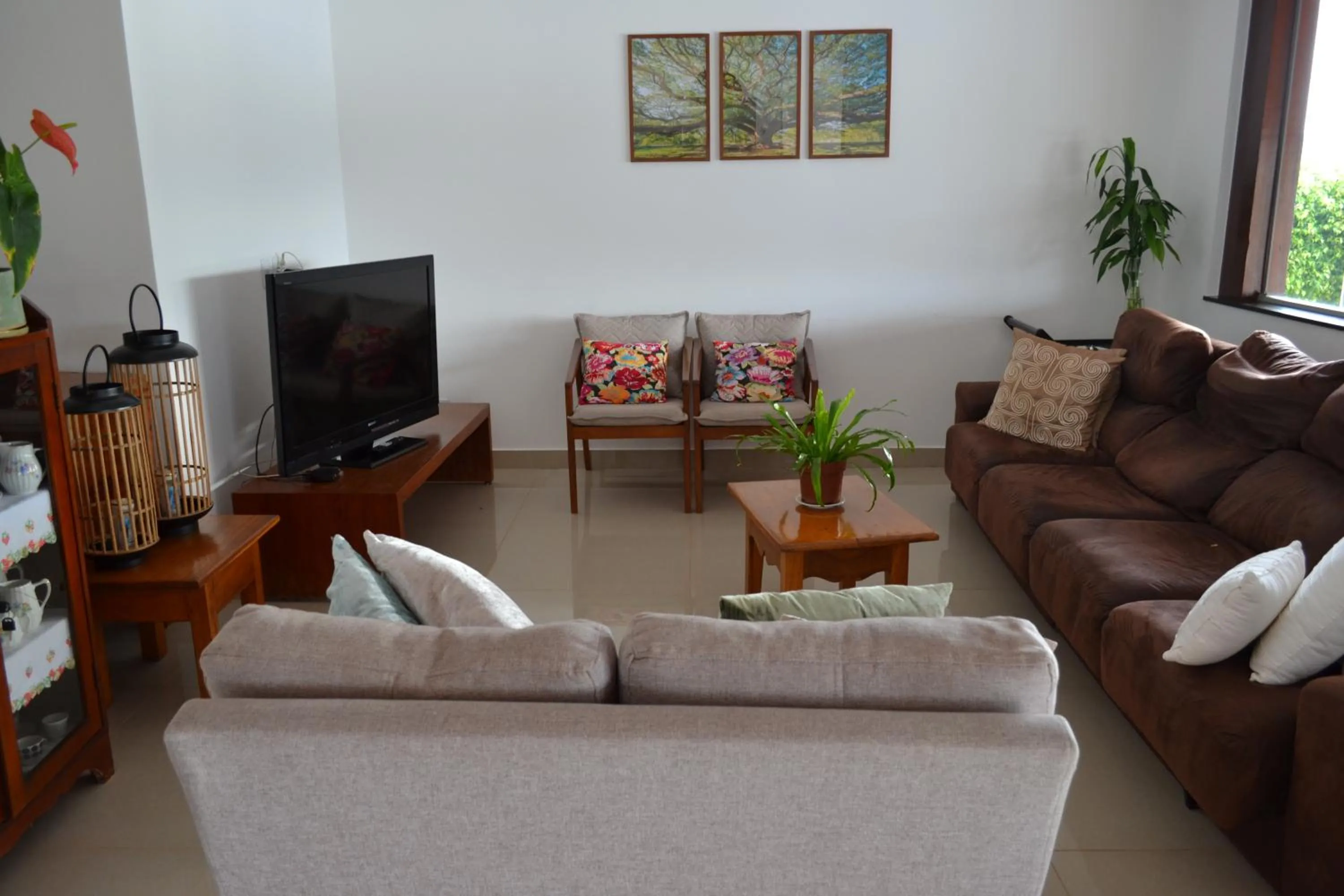 Living room in Pousada Suítes do Lago