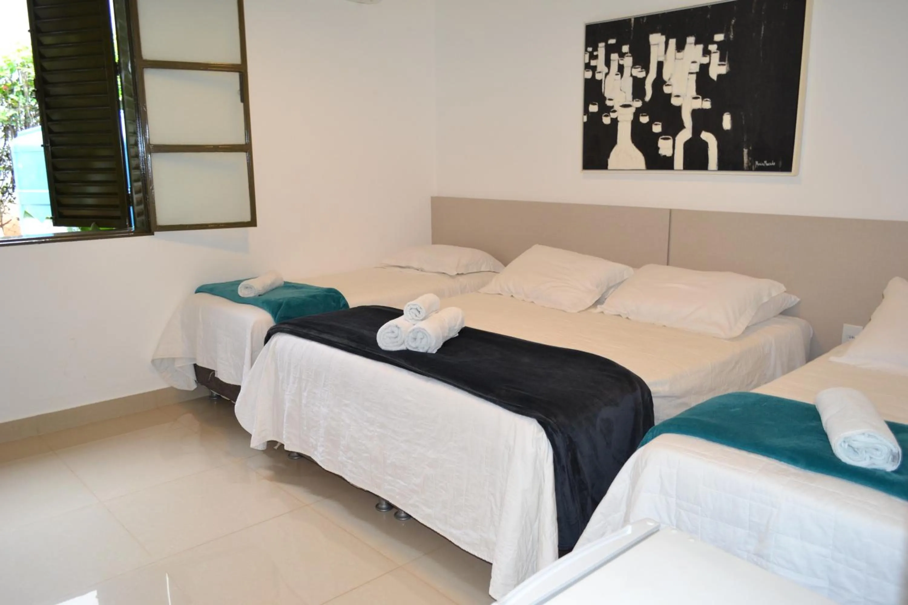 Bedroom, Bed in Pousada Suítes do Lago
