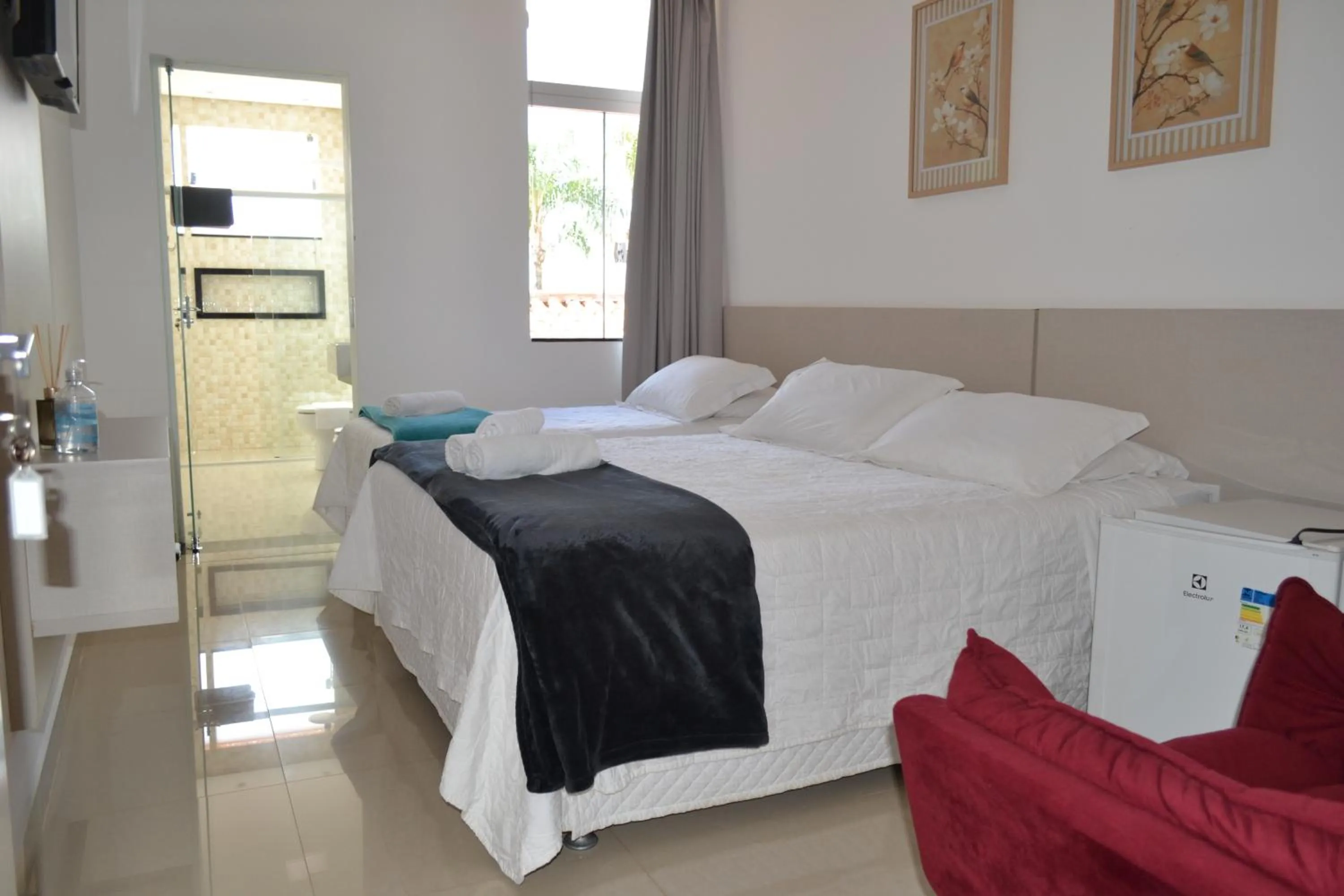 Bedroom, Bed in Pousada Suítes do Lago
