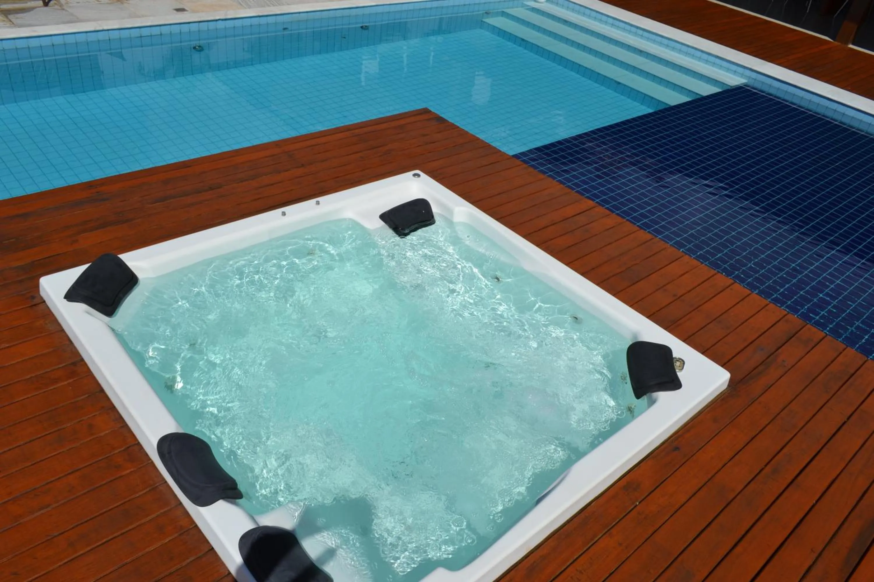Swimming pool in Pousada Suítes do Lago